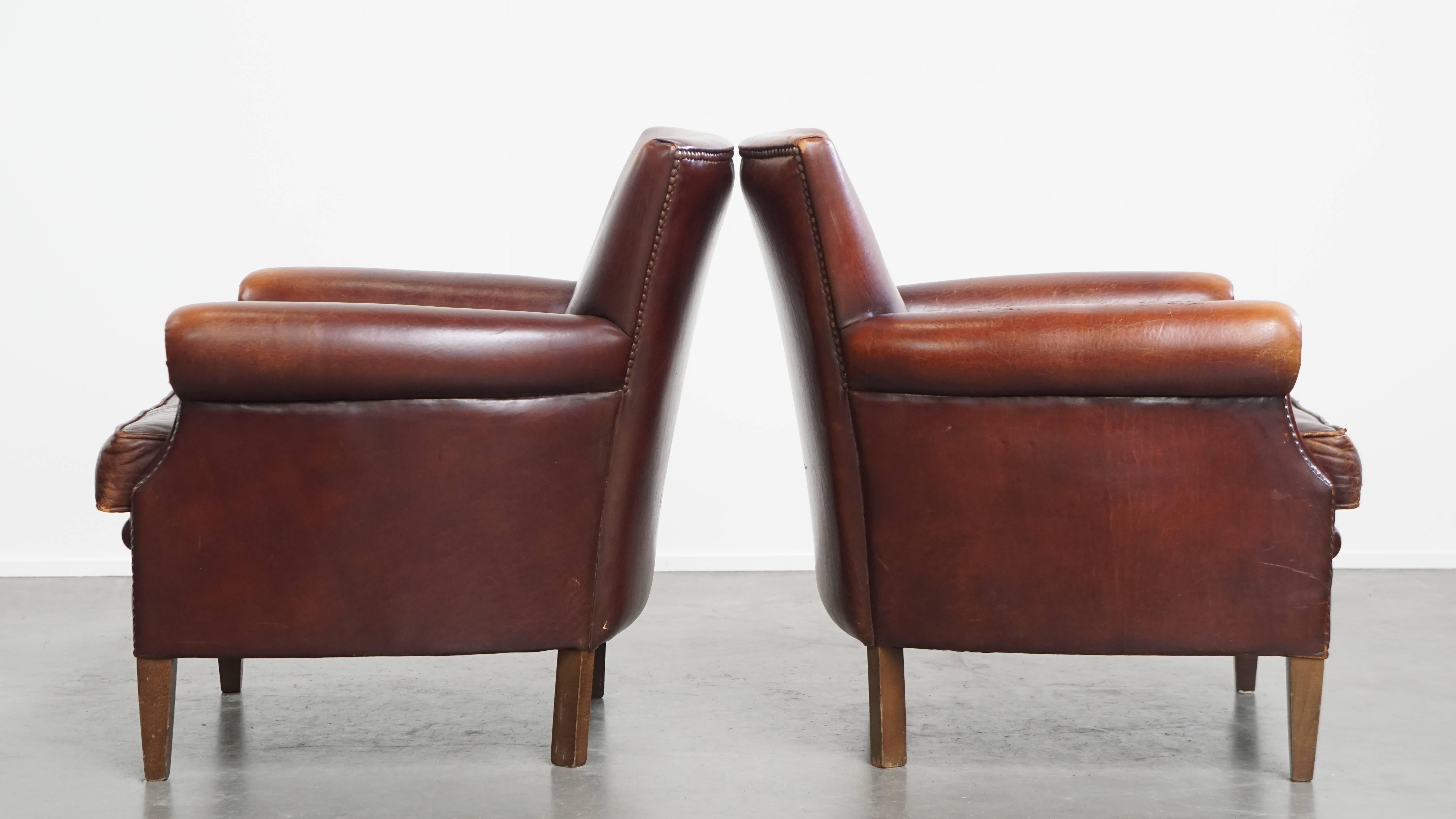 Hand-Crafted Set of 2 vintage sheepskin leather armchairs For Sale