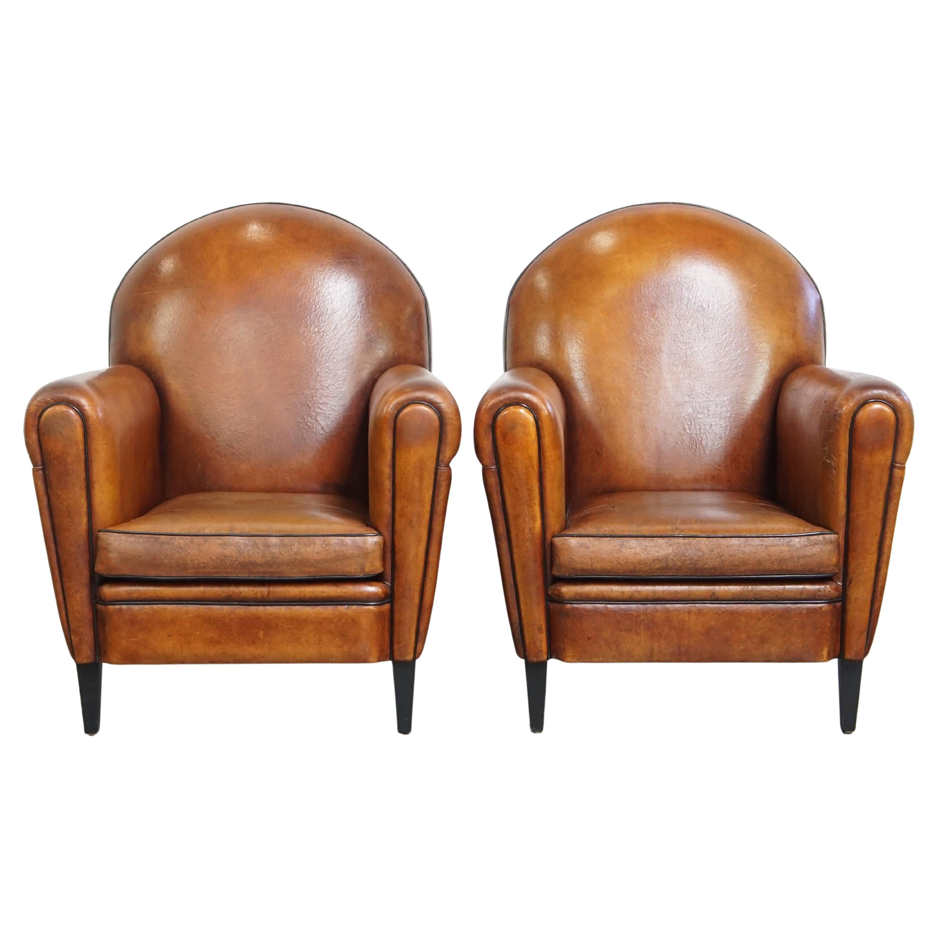 Lot de 2 fauteuils Vintage en cuir de mouton de style Art Deco Design en vente