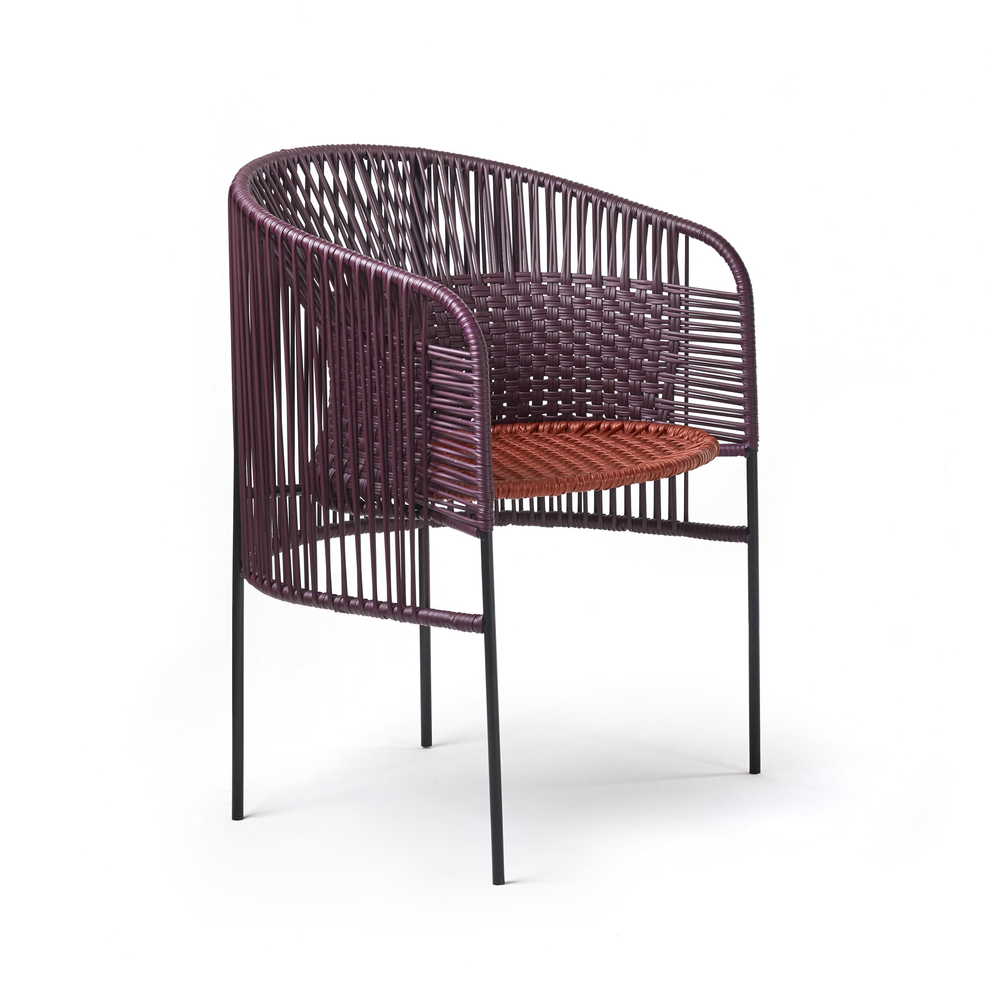 Set of 2 Violet orange caribe chic dining chair by Sebastian Herkner
Materials: Galvanized and powder-coated tubular steel. PVC strings are made from recycled plastic.
Technique: Made from recycled plastic and weaved by local craftspeople in