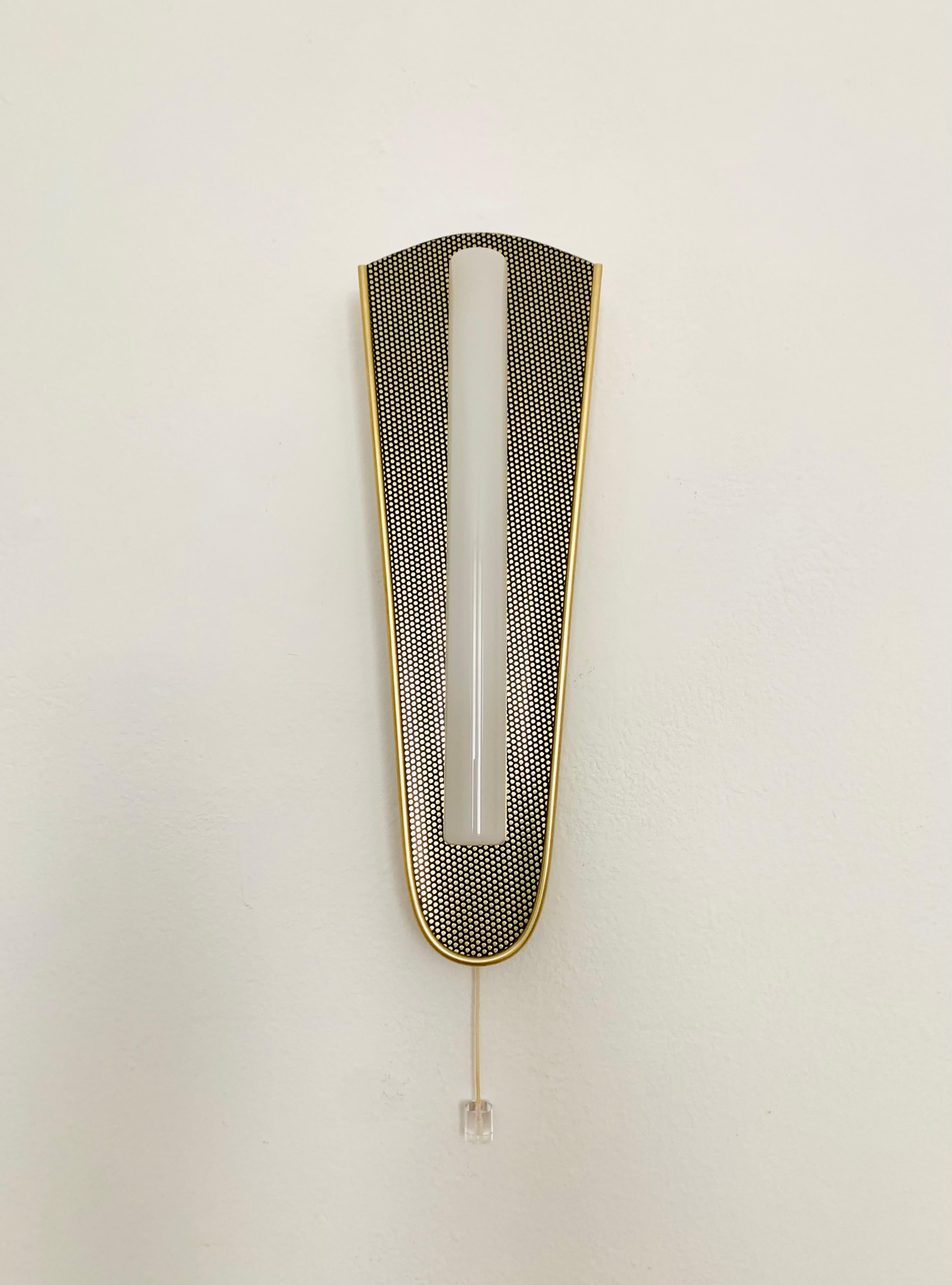 Particularly beautiful wall lamp from Erco from the 1960s.
Wonderful and contemporary design.
The lamp is manufactured to a very high quality and is a highlight for every home.

Manufacturer: Erco

Condition:

Very good vintage condition with slight