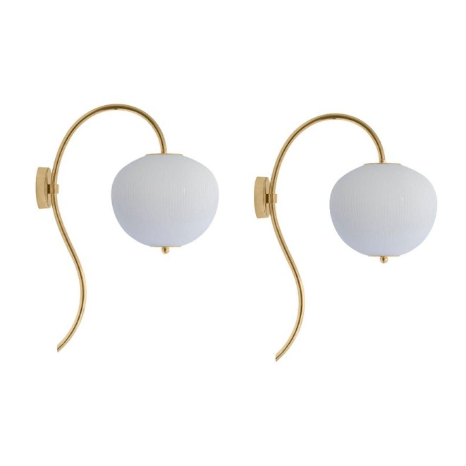 Wall lamp China 03 by Magic Circus Editions
Dimensions: H 62 x W 26.2 x D 41.5 cm
Materials: Brass, mouth blown glass sculpted with a diamond saw
Colour: rich grey

Available finishes: Brass, nickel
Available colours: enamel soft white, soft rose,