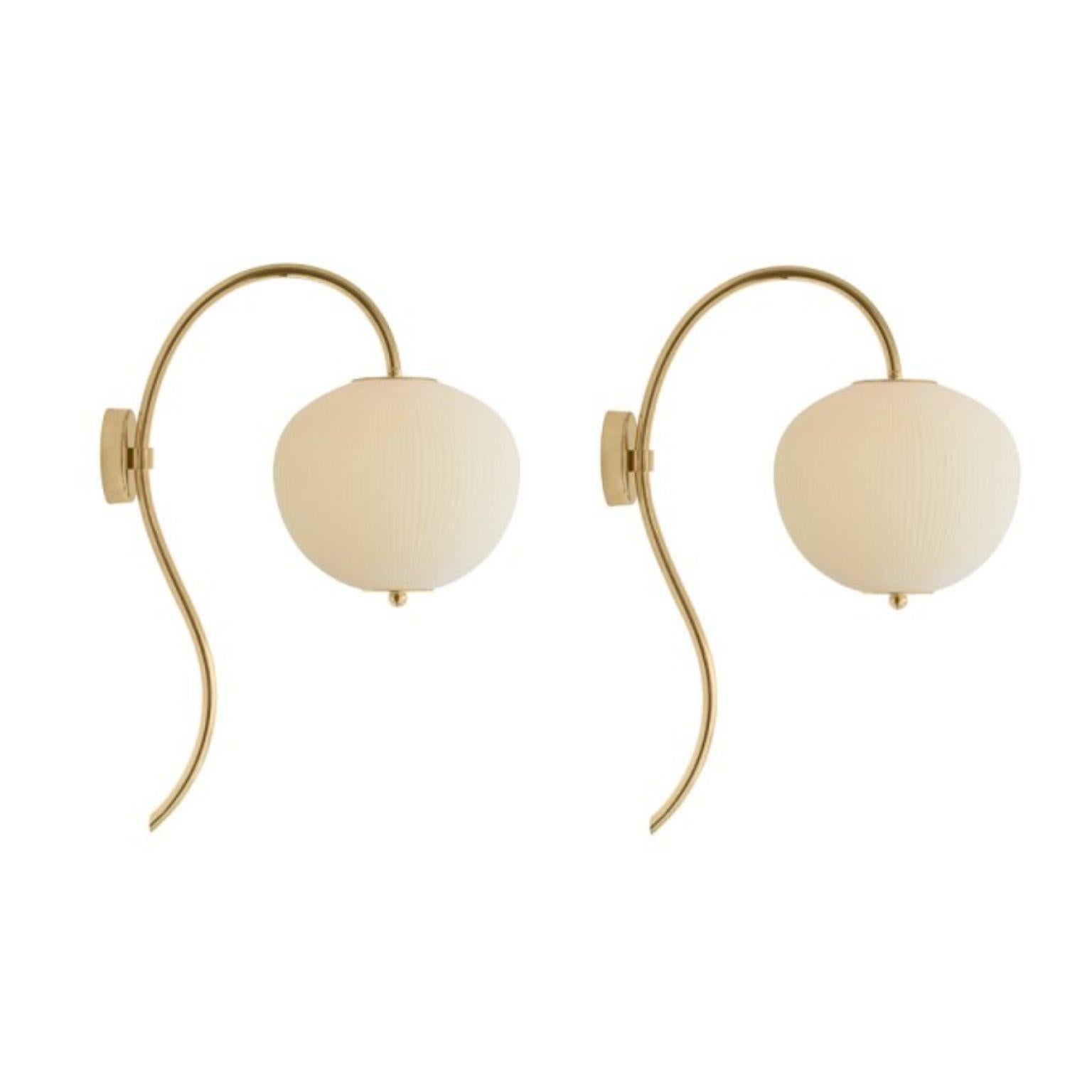 Wall lamp China 03 by Magic Circus Editions
Dimensions: H 62 x W 26.2 x D 41.5 cm
Materials: Brass, mouth blown glass sculpted with a diamond saw
Colour: soft rose

Available finishes: Brass, nickel
Available colors: enamel soft white, soft rose,