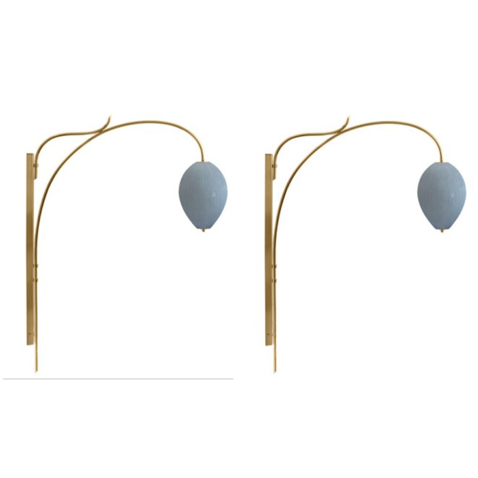 Wall lamp China 10 by Magic Circus Editions
Dimensions: H 134 x W 25.2 x D 113.5 cm
Materials: Brass, mouth blown glass sculpted with a diamond saw
Colour: opal grey

Available finishes: Brass, nickel
Available colours: enamel soft white, soft rose,