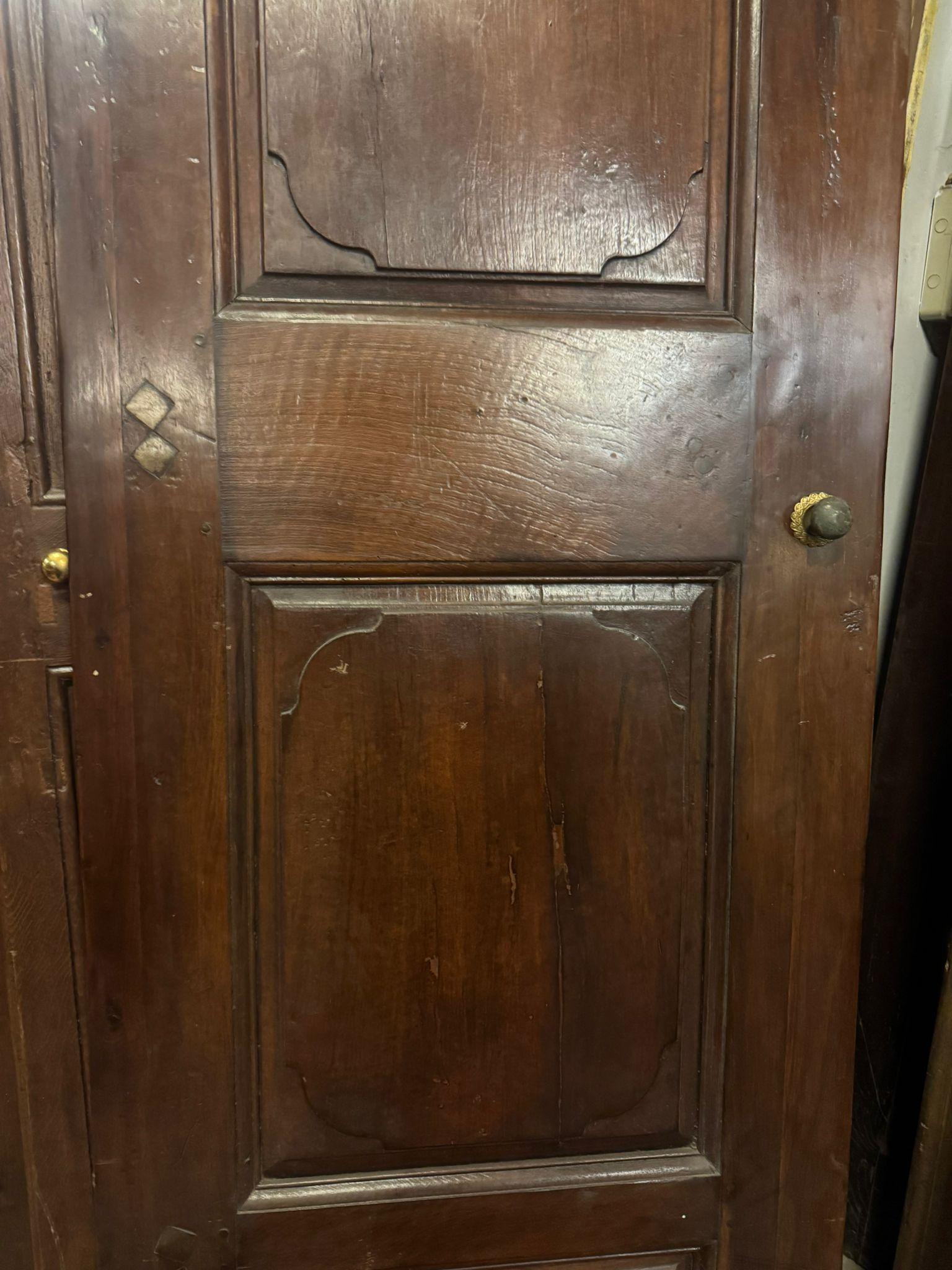 Italian set of 2 walnut doors, one leaf with carved panels, Italy For Sale
