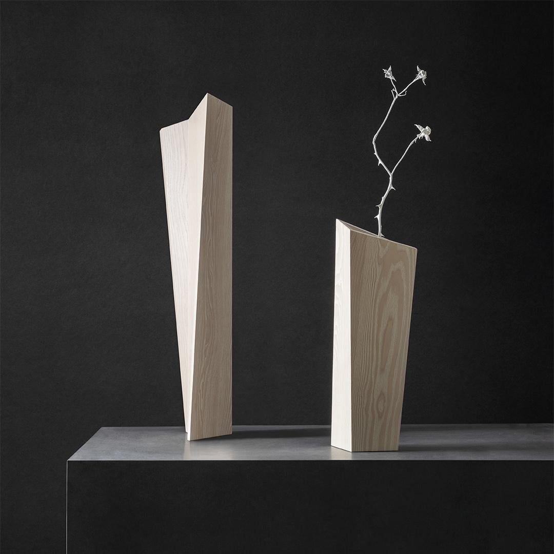 Set of 2 white ash nun vases by Matthias Scherzinger.
Limited edition of 30 pieces, each colour each size.
Engraved brass-label with number.
Dimensions: Small: L 14.5 x W 14.5 x 46 cm.
 Large: L 19 x W 19 x H 73 cm.
Materials: Ash: lyed -