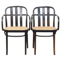 Set of 2 wooden dining chairs with woven seats