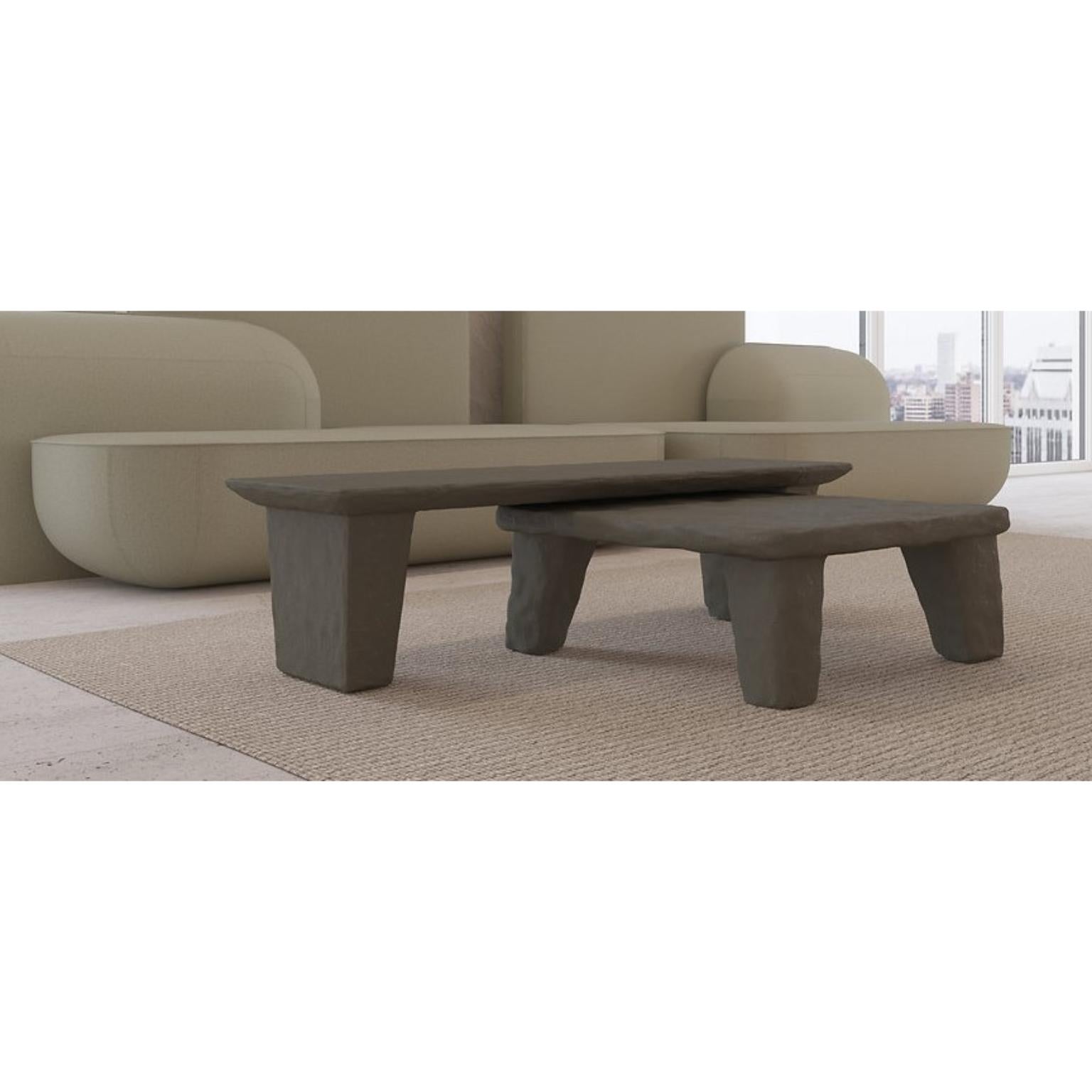Set of 2 Ztista low tables by Faina
Design: Victoriya Yakusha
Materials: steel frame, a blend of cellulose, clay, flax fiber, wood chips, biopolymer cover
Dimensions: 
D 80 x W 160 x H 30 cm
62 x 25 cm
Available in 12 colors. 

Almost carved in