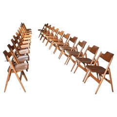 Ensemble de 20 chaises pliantes Egon Eiermann en hêtre et métal, Allemagne, années 1950