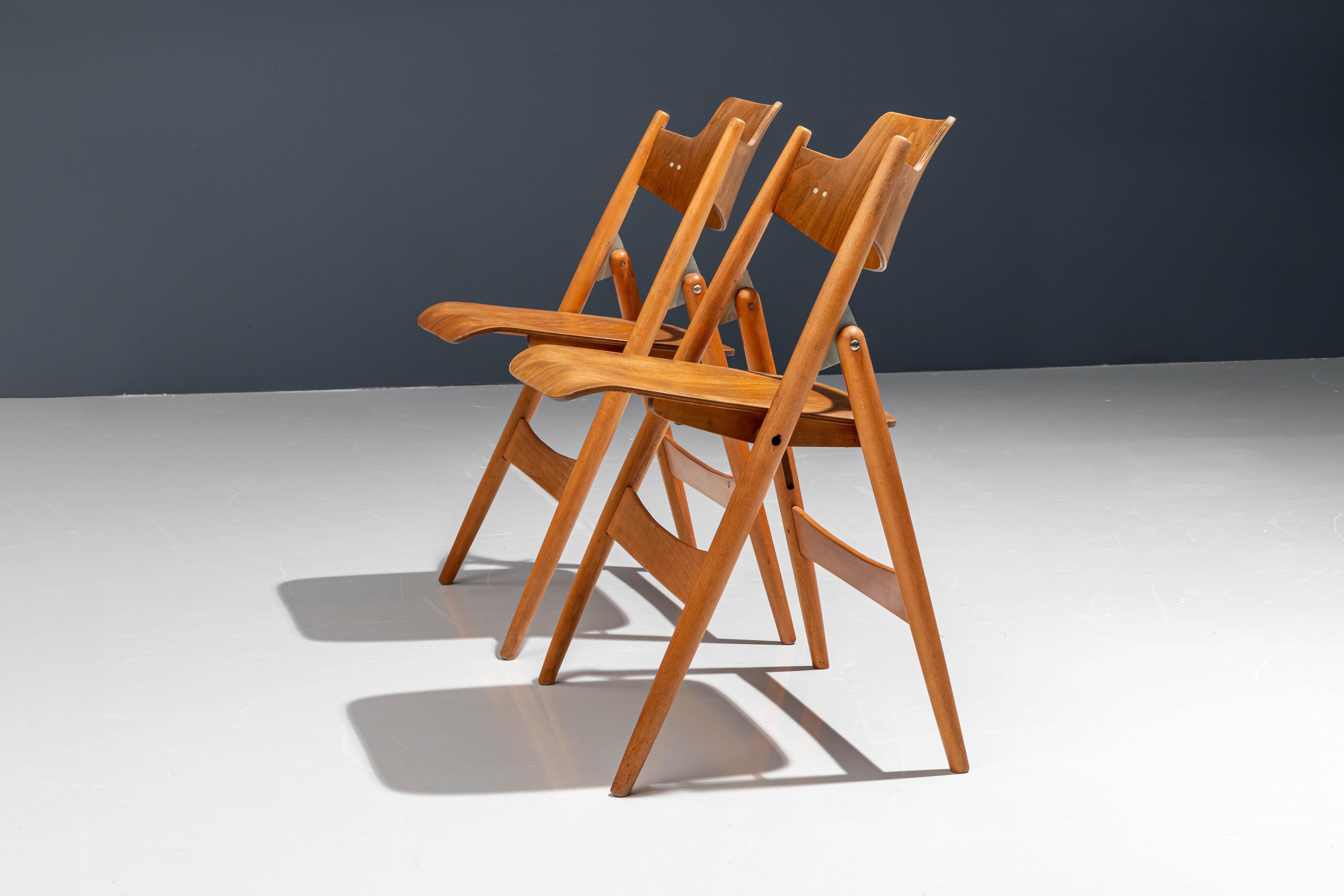 German Set of 20 Fully Restored Egon Eiermann Folding Chairs in Beech and Plywood, 1952 For Sale