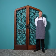 Set of 20th Century Glazed Arched Doors With Wrought Iron Bars