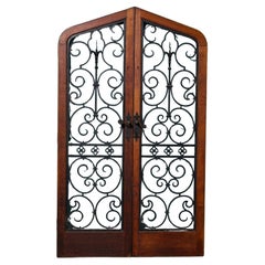 Set of 20th Century Glazed Arched Doors With Wrought Iron Bars
