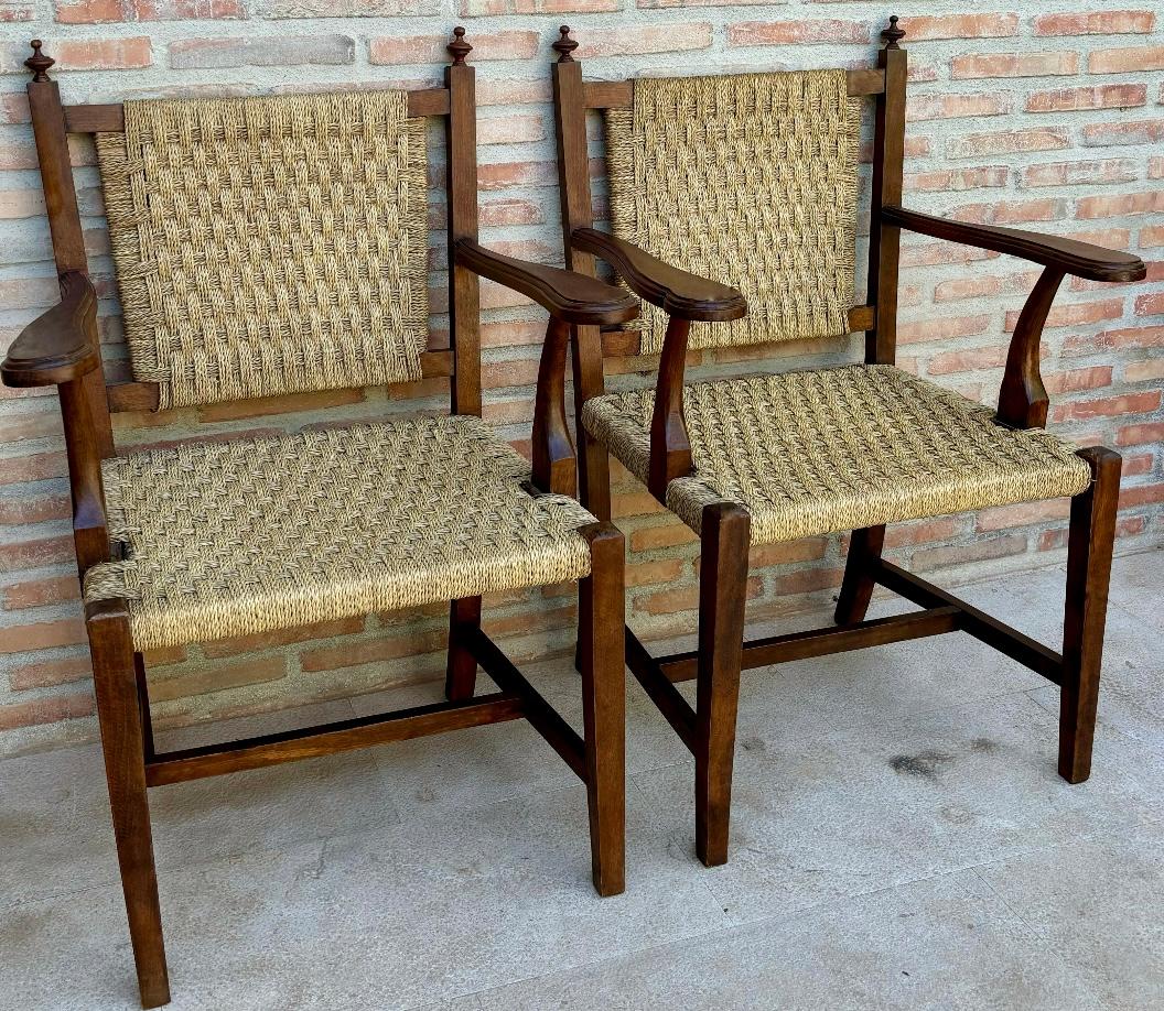 Baroque Ensemble de fauteuils en noyer du 20e siècle avec dossier et assise cannée, 1940 en vente