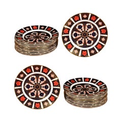 Set of 24 English Royal Crown Derby Porcelain Plates with Old Imari Patterns