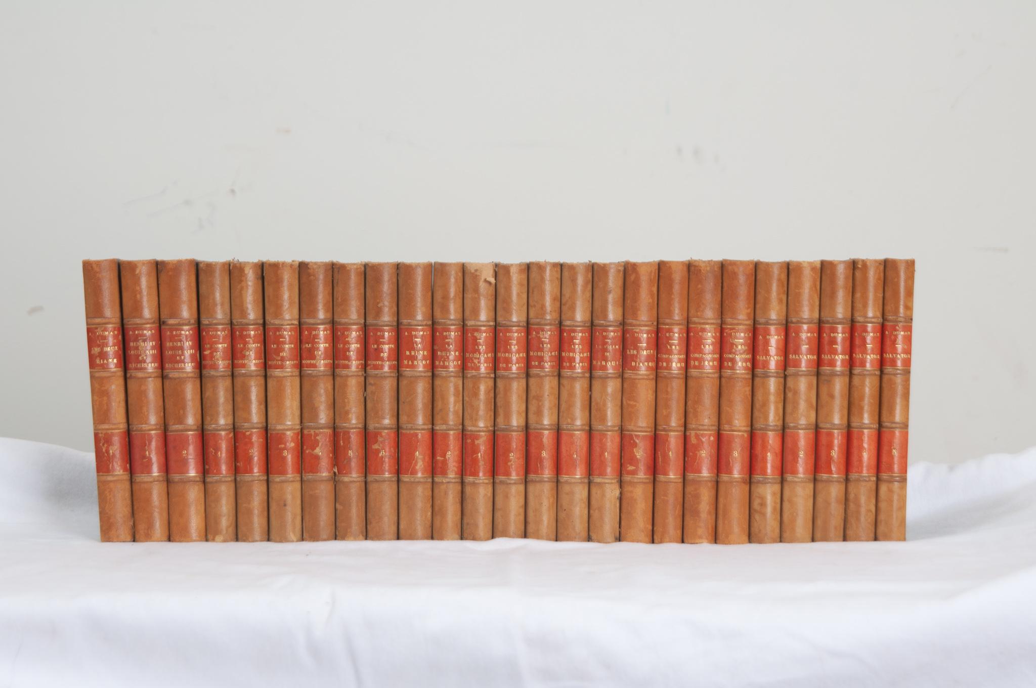 A collection of twenty-five volumes of works by French author Alexandre Dumas. This set of books is bound in leather with gold lettering stating, title, and respective volume. Written in 1882, this set includes a majority of the author’s works.