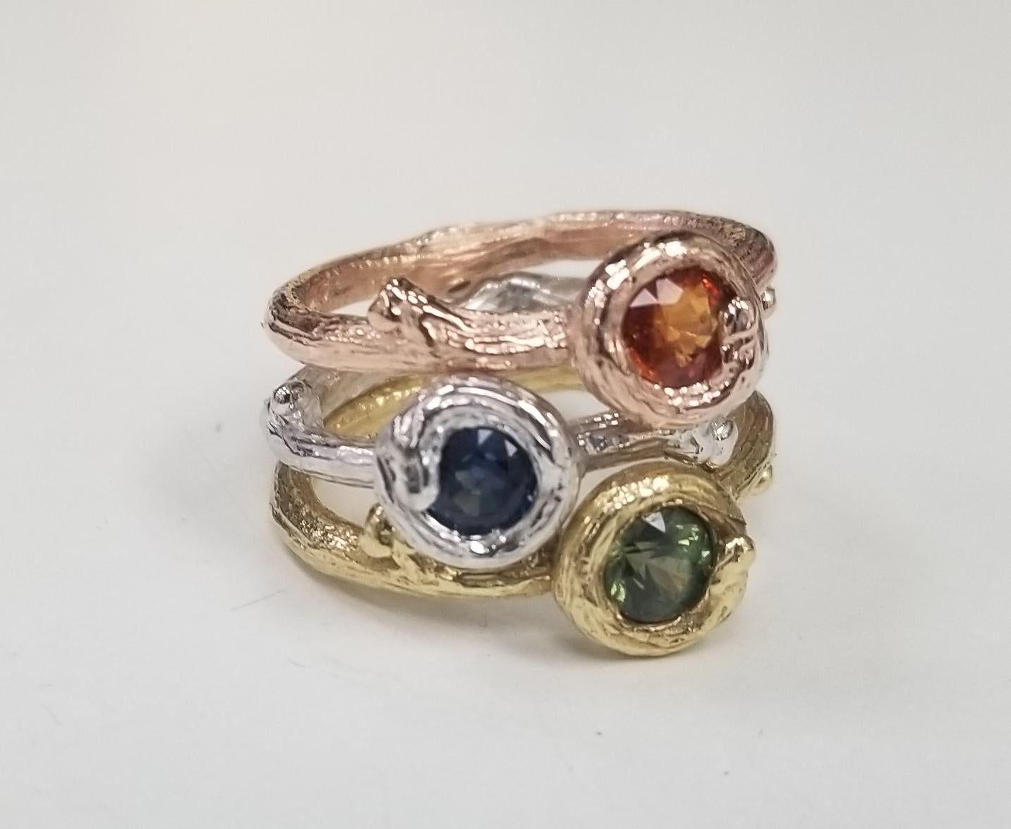 14k white, rose or yellow gold Gresha signature bark ring with 5mm Green, Blue and  Orange sapphire weighing .50pts. each. 

*Available in 14k yellow, white or rose with green, yellow, orange, and pink sapphire. pick your combinations.*

*Rings are