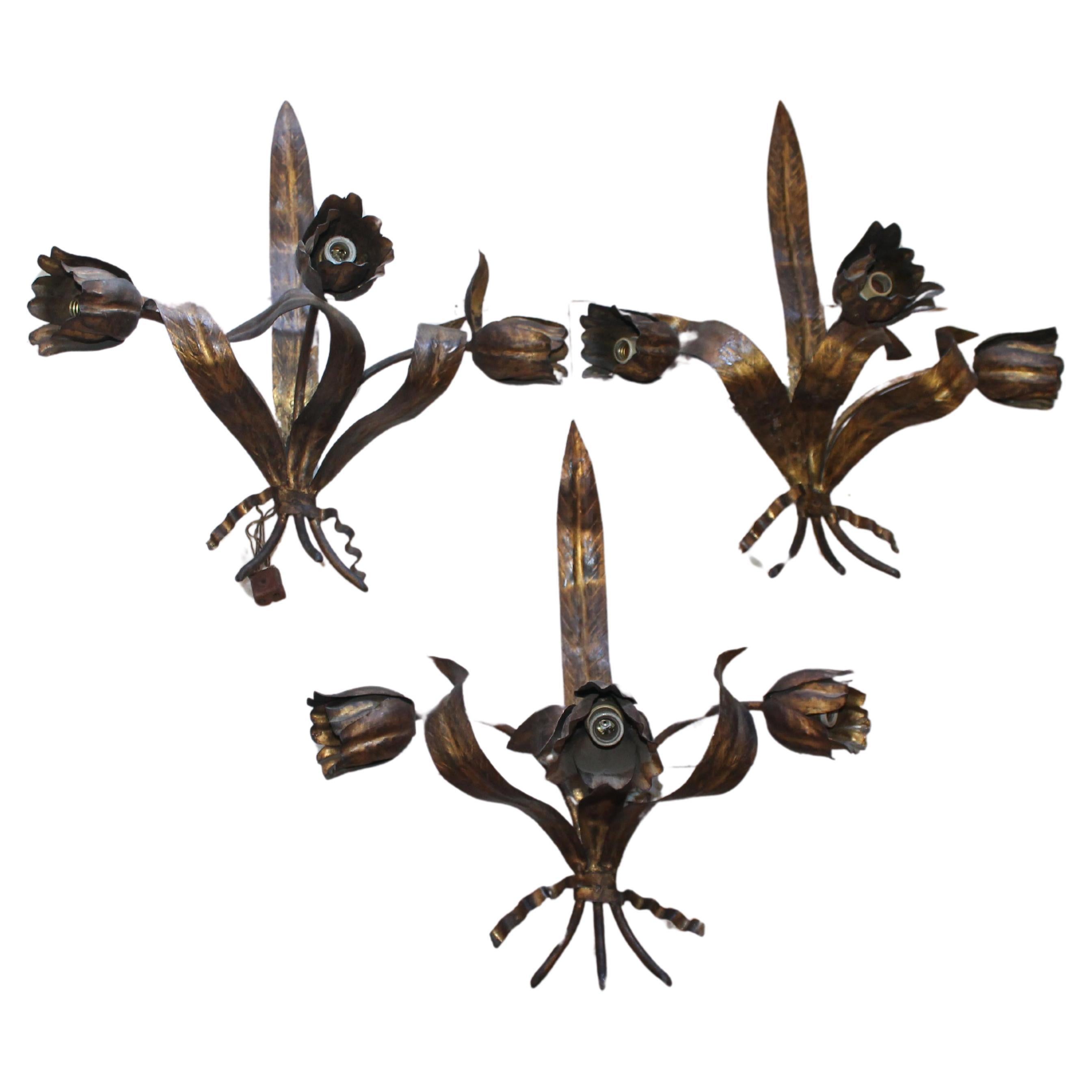 Set of 3 19thc French Louis XVI style Wall Sconces in a Distressed Gilt Metal For Sale