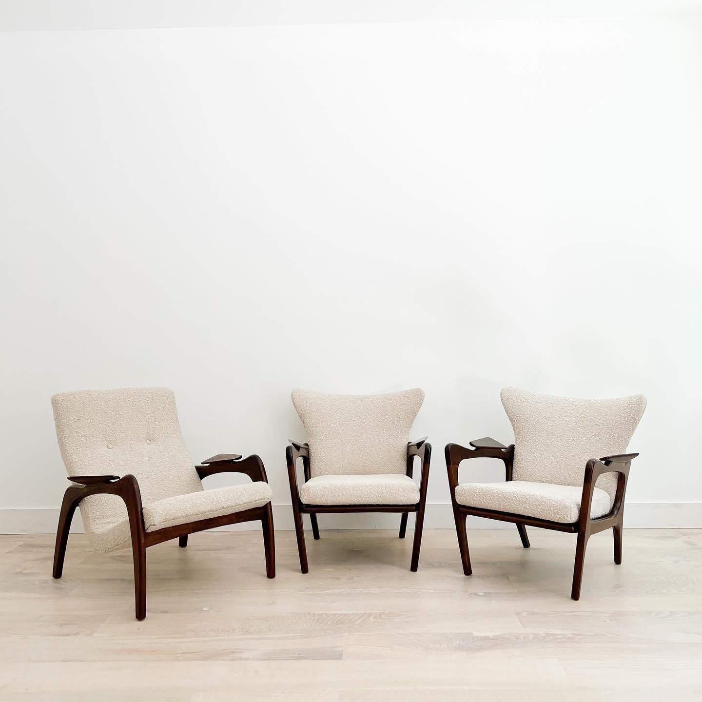 Hard to find, set of 3 Adrian Pearsall lounge chairs!

Pair of Mid-Century Modern wingback lounge chairs designed by Adrian Pearsall for Craft Associates. The sculpted solid walnut wood frames are in good condition overall with only light