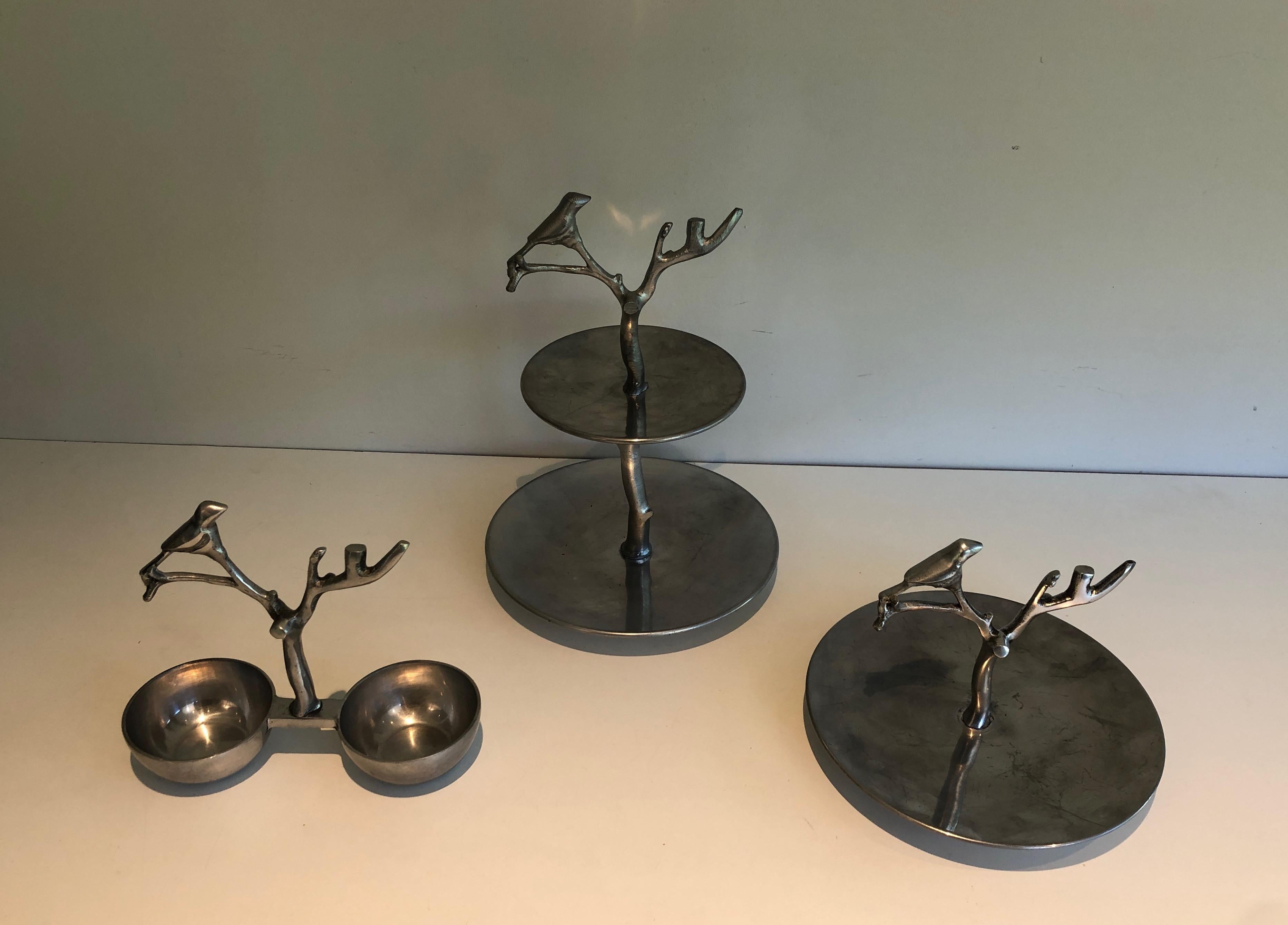 This set of 3 serving pieces with birds and branches is made of aluminum. Circa 1970.