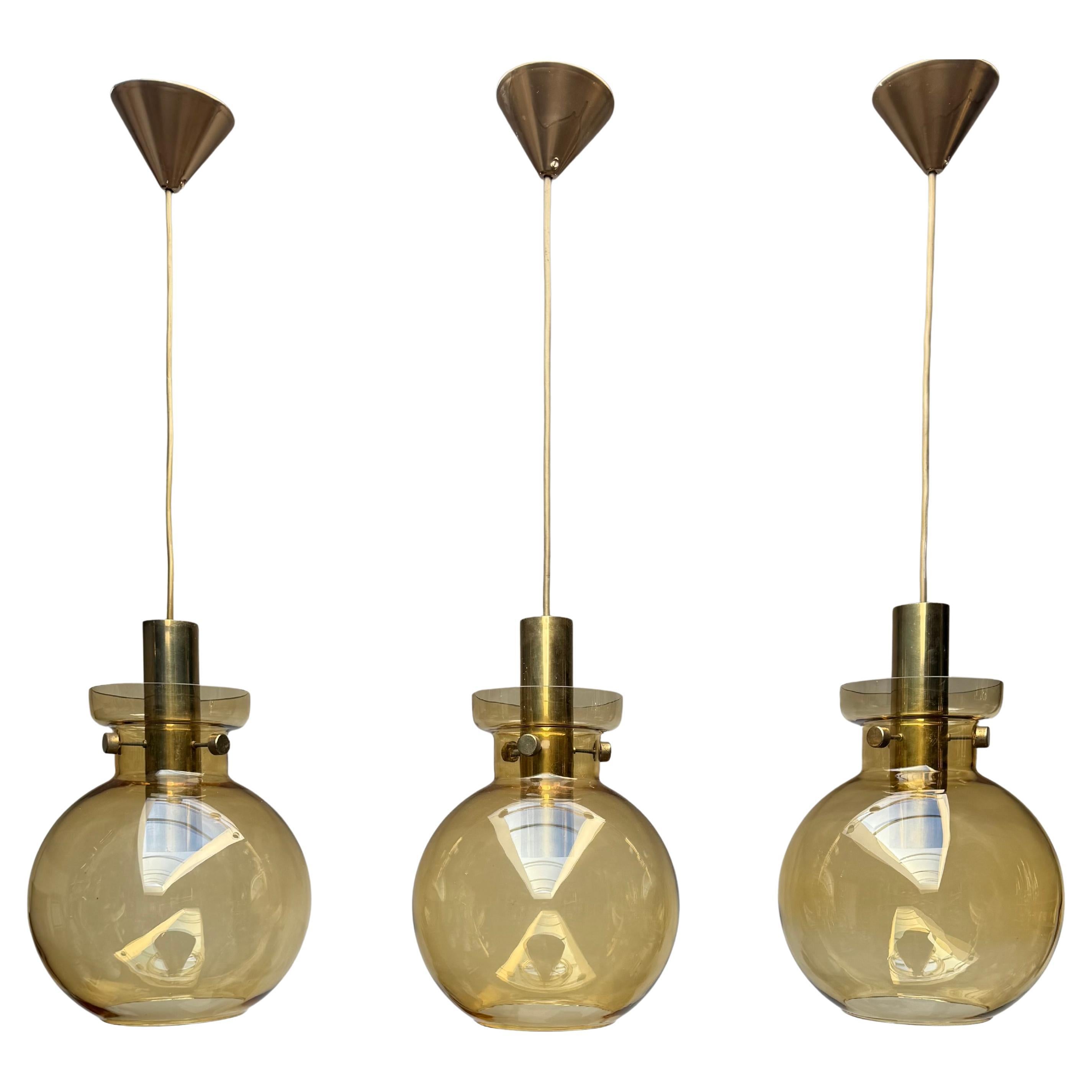 Set of 3 Amber Glass and Brass Pendant Lights Glasshütte, Germany 1970s