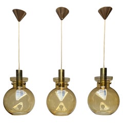 Set of 3 Amber Glass and Brass Pendant Lights Glasshütte, Germany 1970s