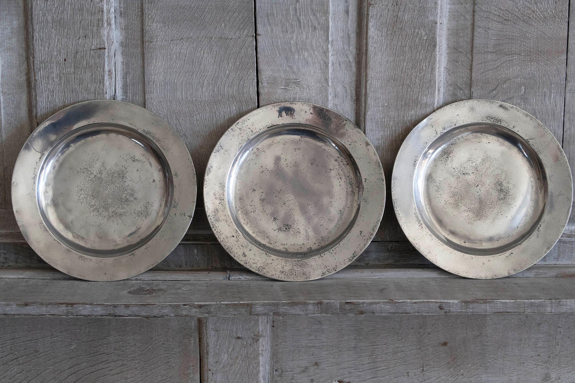 Lovely highly polished pewter plates.

All three with London touchmarks on the underside. One with ownership inscription on the front.

The pewter has been polished to its original shine to imitate polished silver. It was known as the Poor Man's