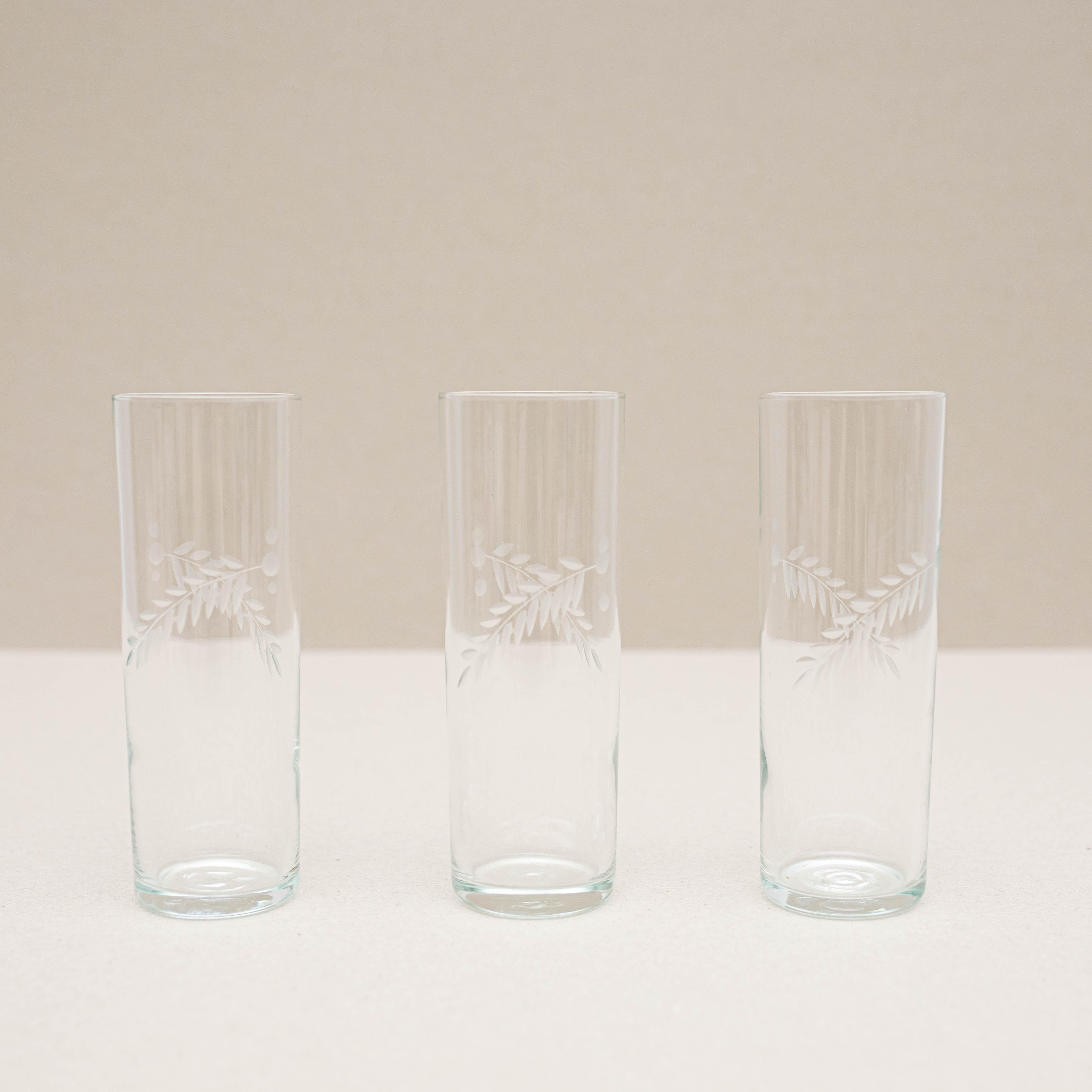 Set of 3 antique crystal glasses.

Made by unknown manufacturer in Spain, circa 1970.

In original condition, with minor wear consistent with age and use, preserving a beautiful patina.

Materials:
Glass

Dimensions:
H 16.5cm 
Ø