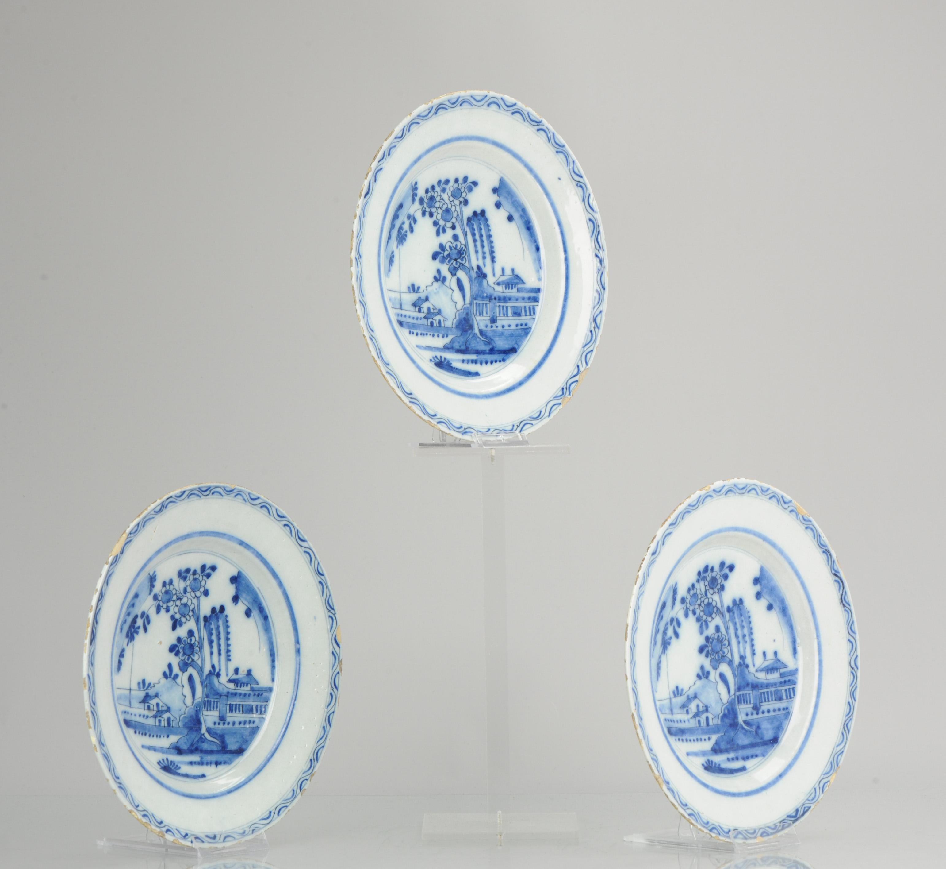 Very cool 17/18C Delft Porcelain plates with hand painted decoration. Inspired on Chinese pieces from the same period. Very interesting scene of a garden landscape with houses & Scholarsrock.

Additional information:
Material: Overall Condition; The