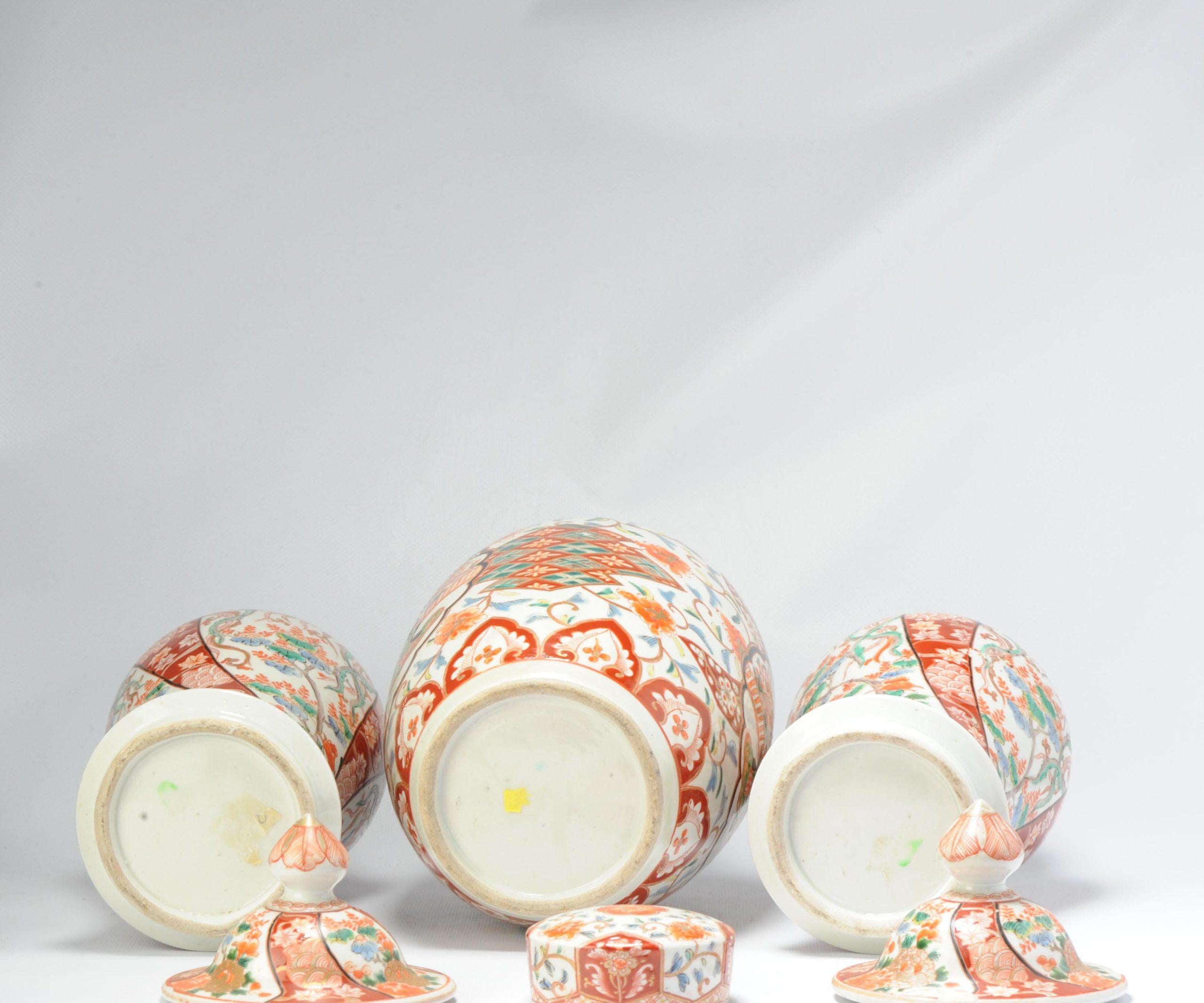 Porcelain Set of 3 Antique Garniture Japanese Arita Vases and a Ginger Jar, 19th Century For Sale
