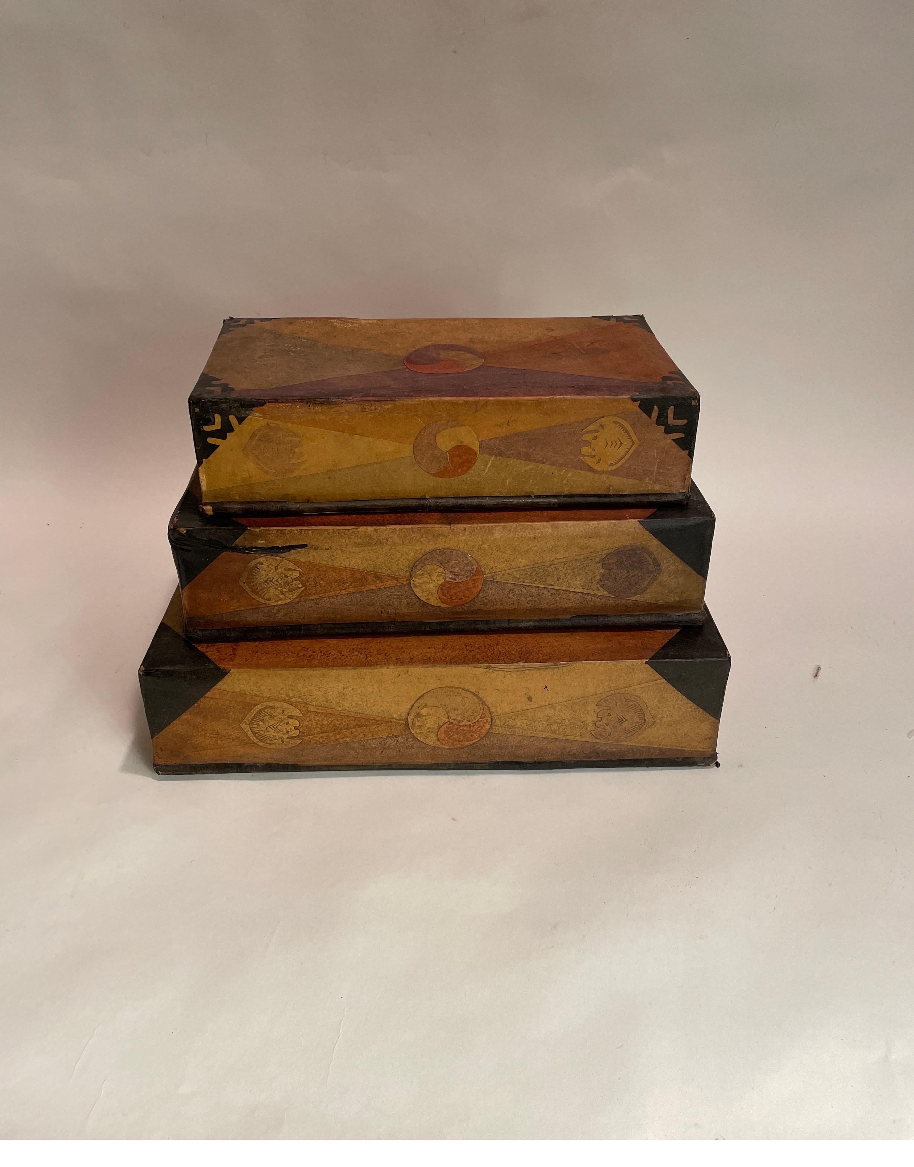 A set of 3 antique Korean paper mache sewing boxes from the Choson period.