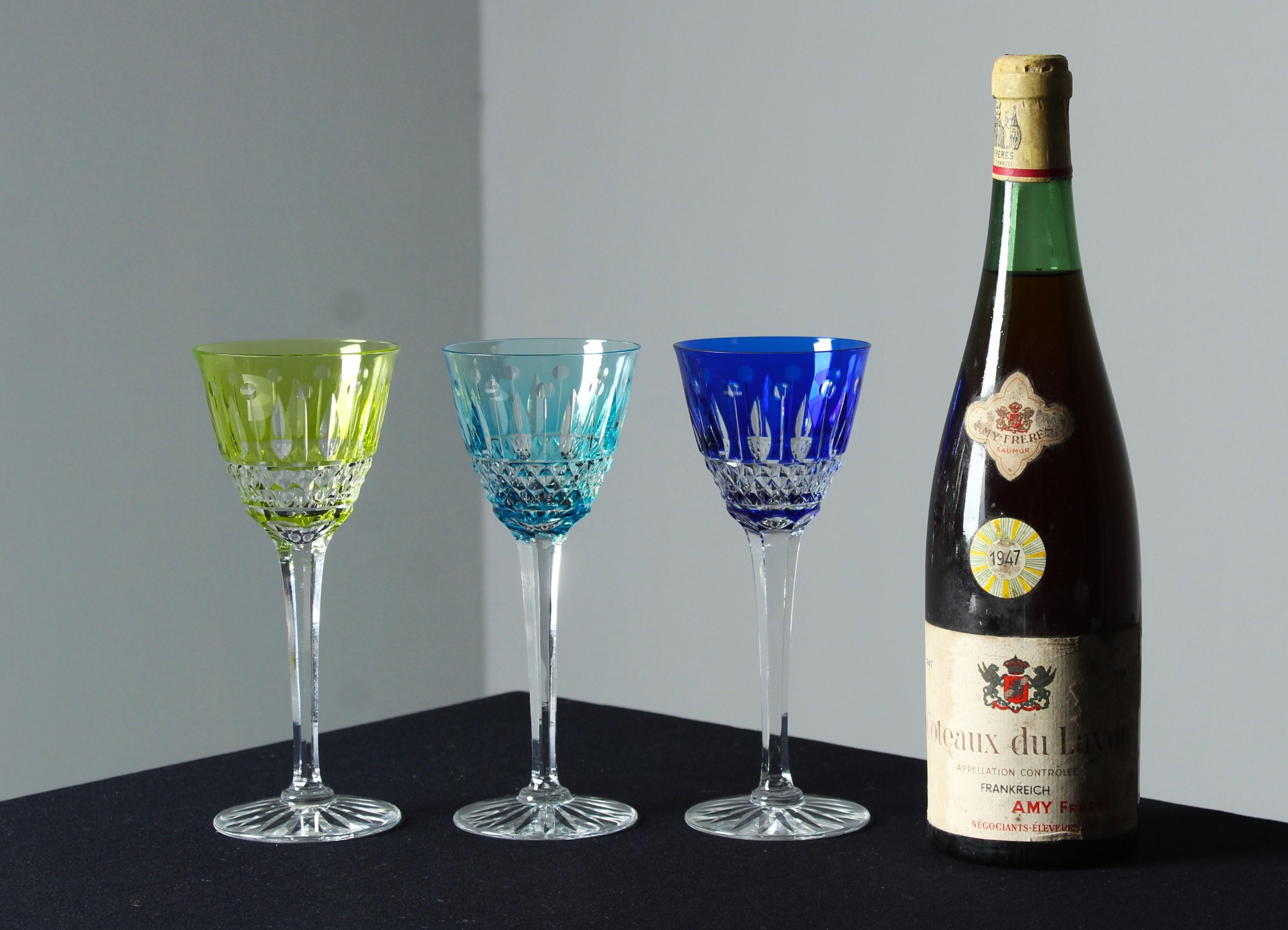 A beautiful set of three aperitif glasses in green, turqouise and blue.

In 19th century France, the art of glassmaking experienced a renaissance inspired by the rich history and heritage of ancient techniques. Antique glasses from this era are not