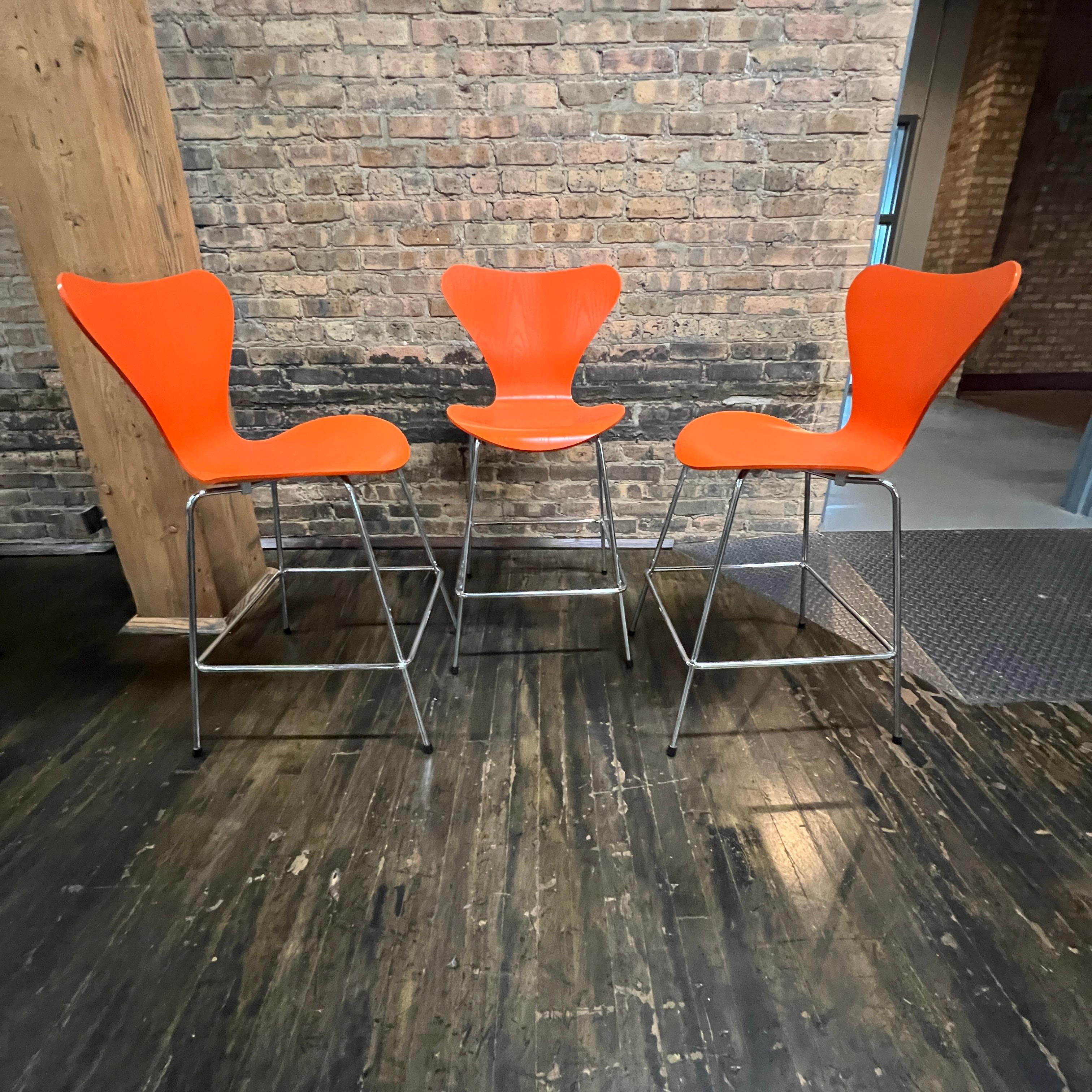 Danish Set of 3 Arne Jacobsen for Fritz Hansen Series 7 Counter Stools in Orange