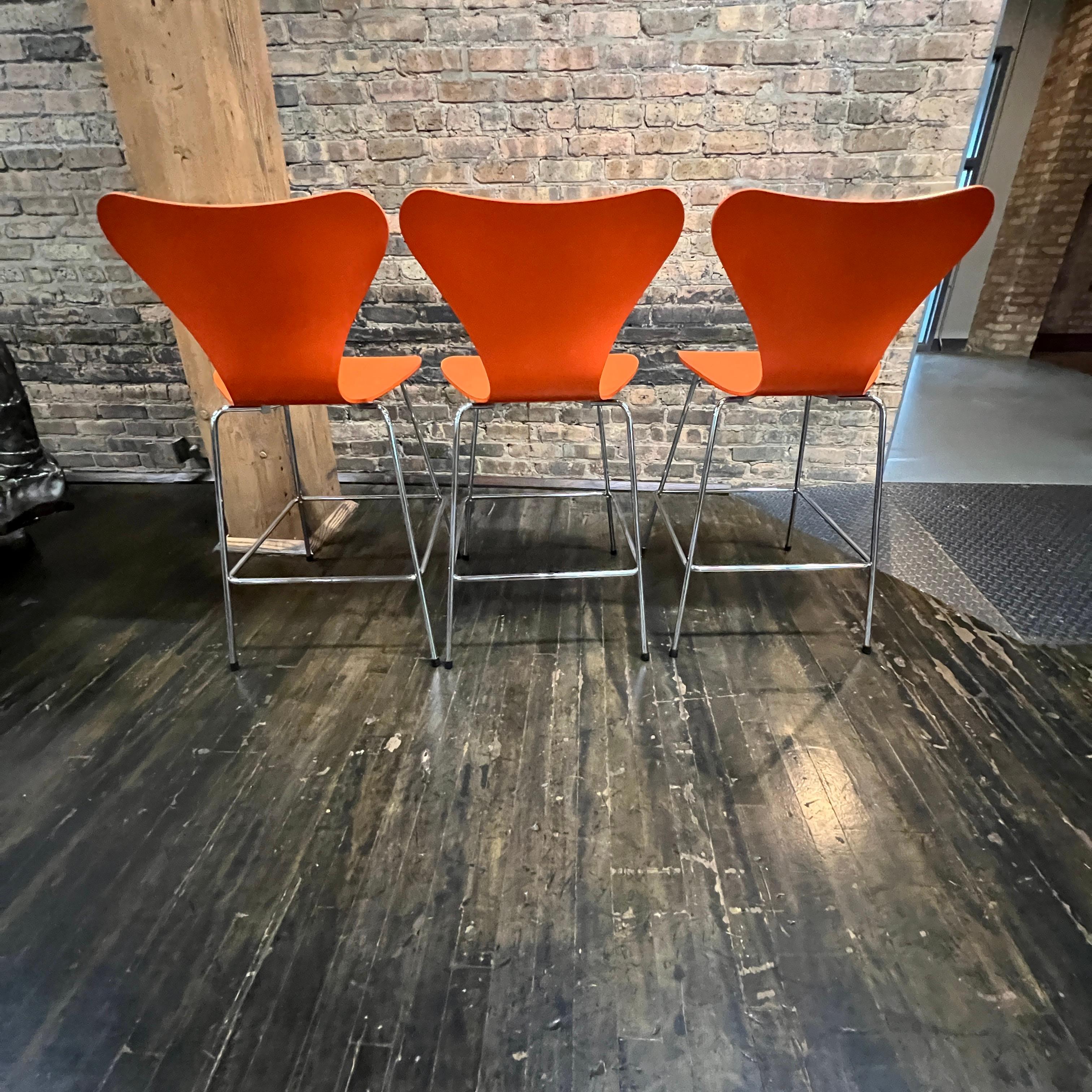 Metal Set of 3 Arne Jacobsen for Fritz Hansen Series 7 Counter Stools in Orange