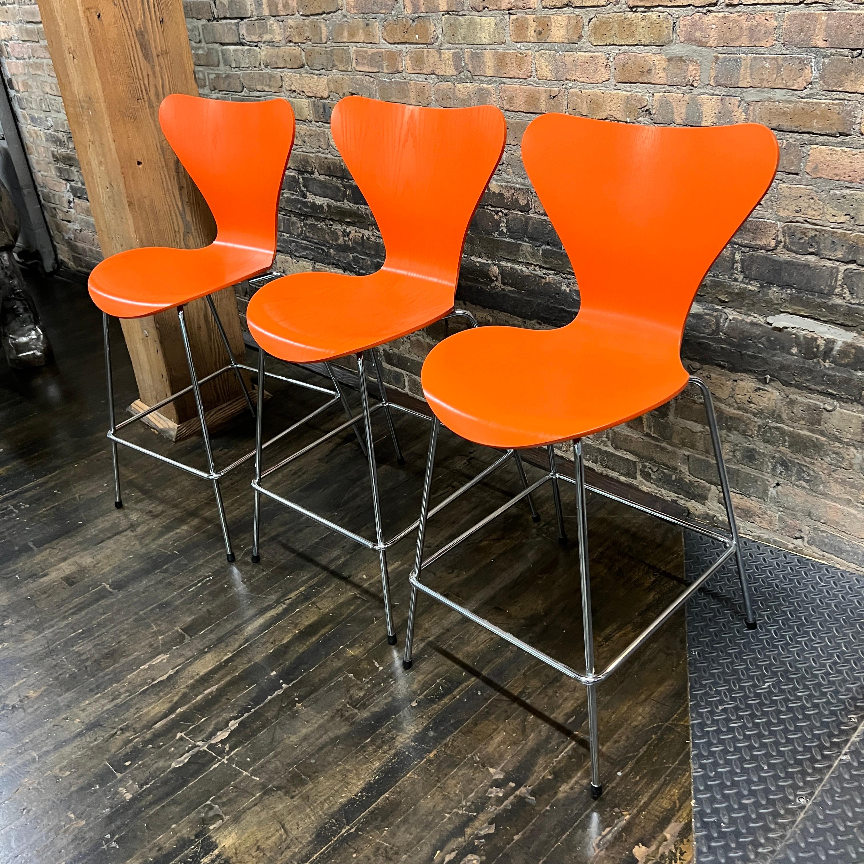 Set of 3 Arne Jacobsen for Fritz Hansen Series 7 Counter Stools in Orange 2