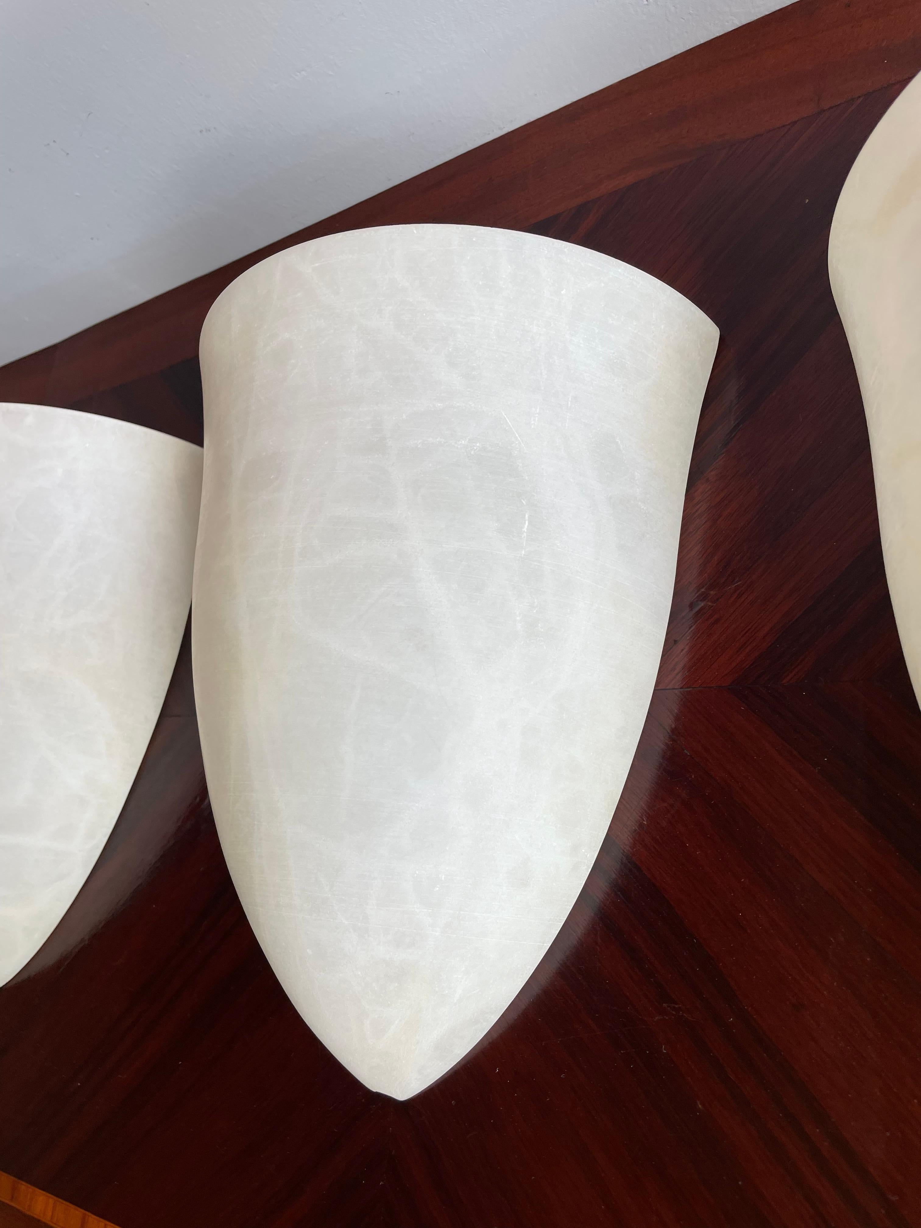 Polished Set of 3 Art Deco Style Midcentury Era Cocoon Shape White Alabaster Wall Sconces