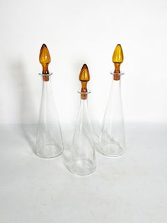 Set of 3 art glass bottles with orange-brown stoppers, France, 1970