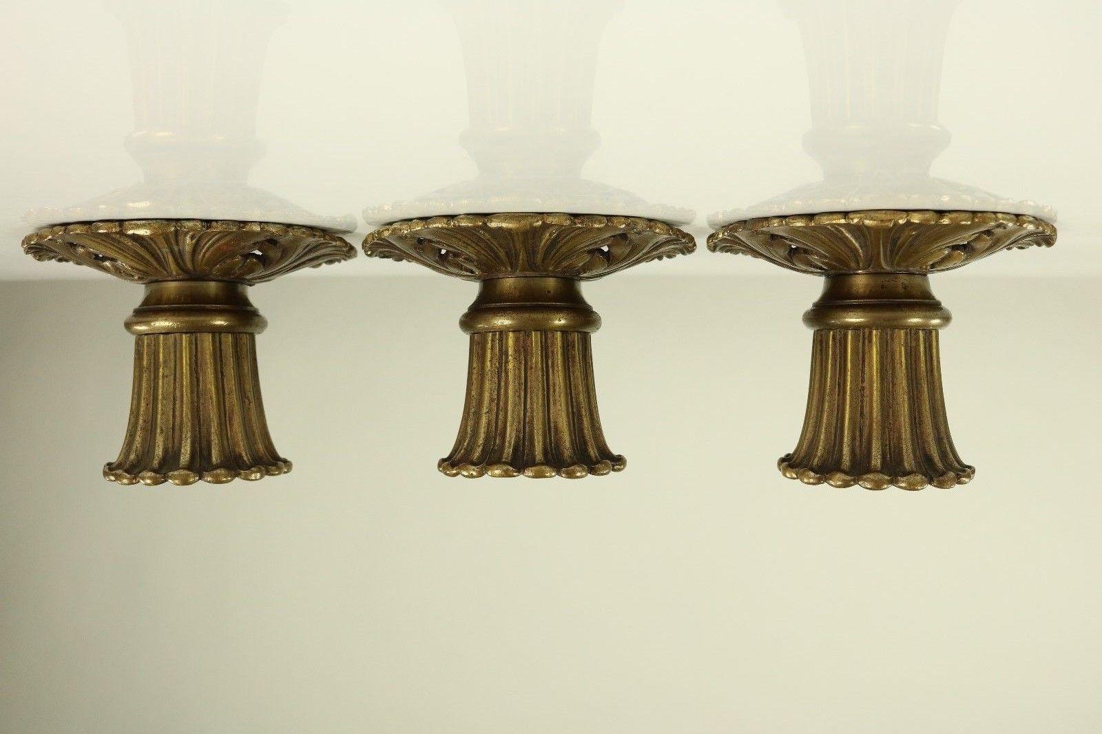 A typical Art Nouveau set of three-wall or ceiling fixture lights
made of solid brass casting in France about 1910-1920
the wiring is save and new
you need medium Edison screw bulbs (E27) to operate
(not included in this offer)
in very fine