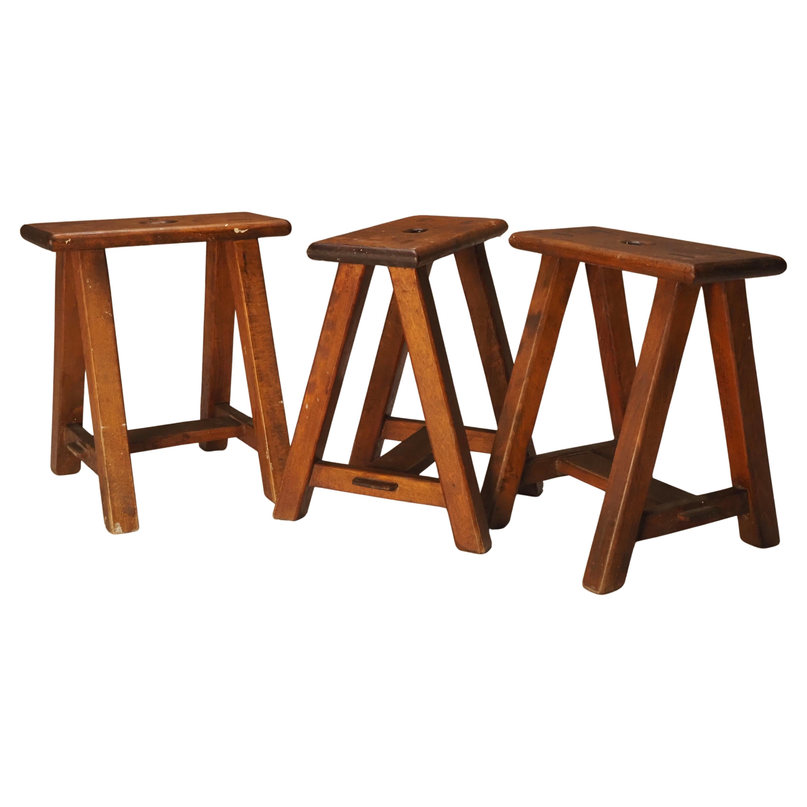 Set of 3 artists studio stools For Sale