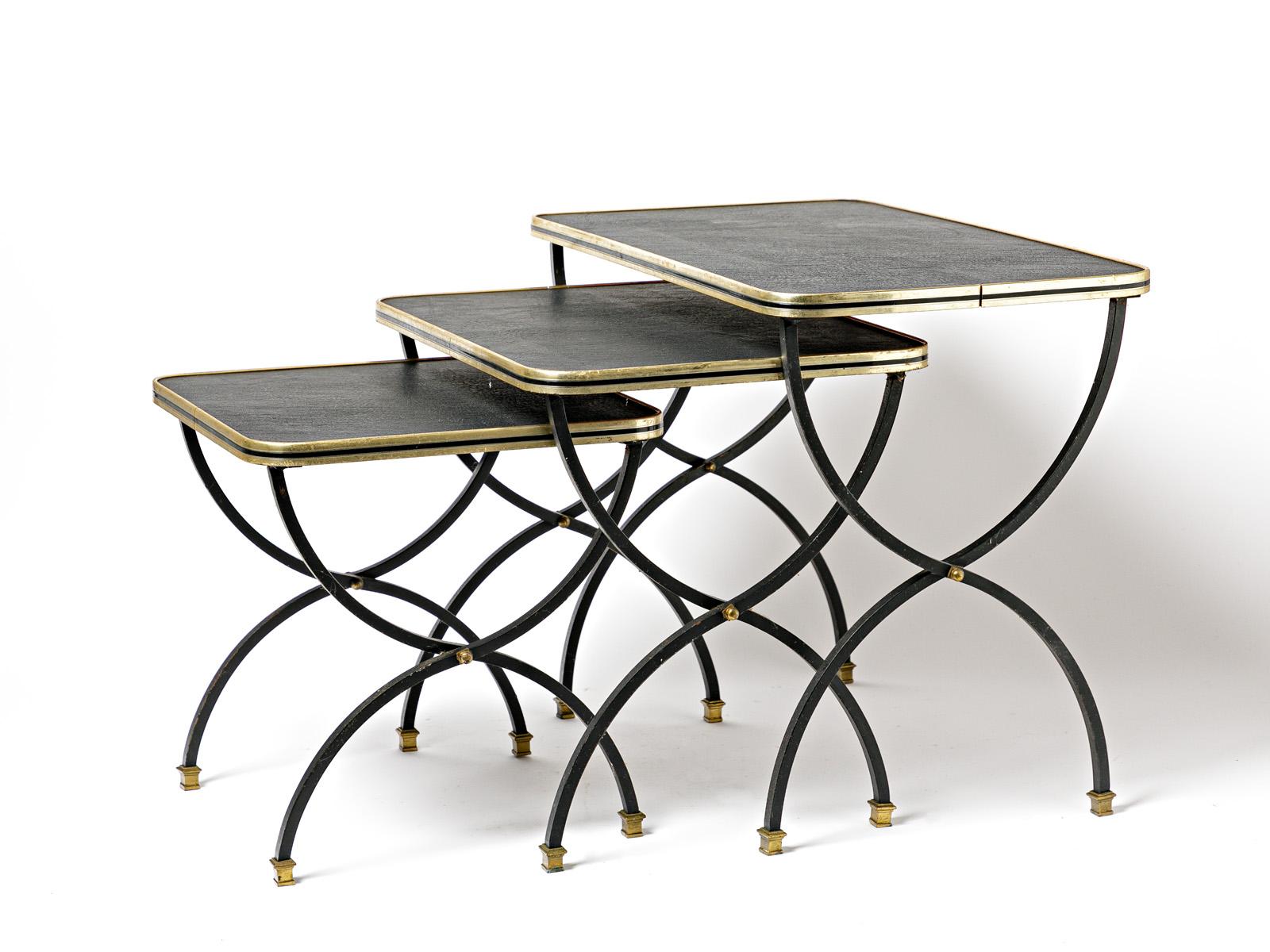 In the style of Jacques Adnet


Original set of 3 low tables in black metal, brass and leatherette

Circa 1960

Original very good condition

Size of the biggest
height 45 cm
Large 53 cm
depth 33 cm
