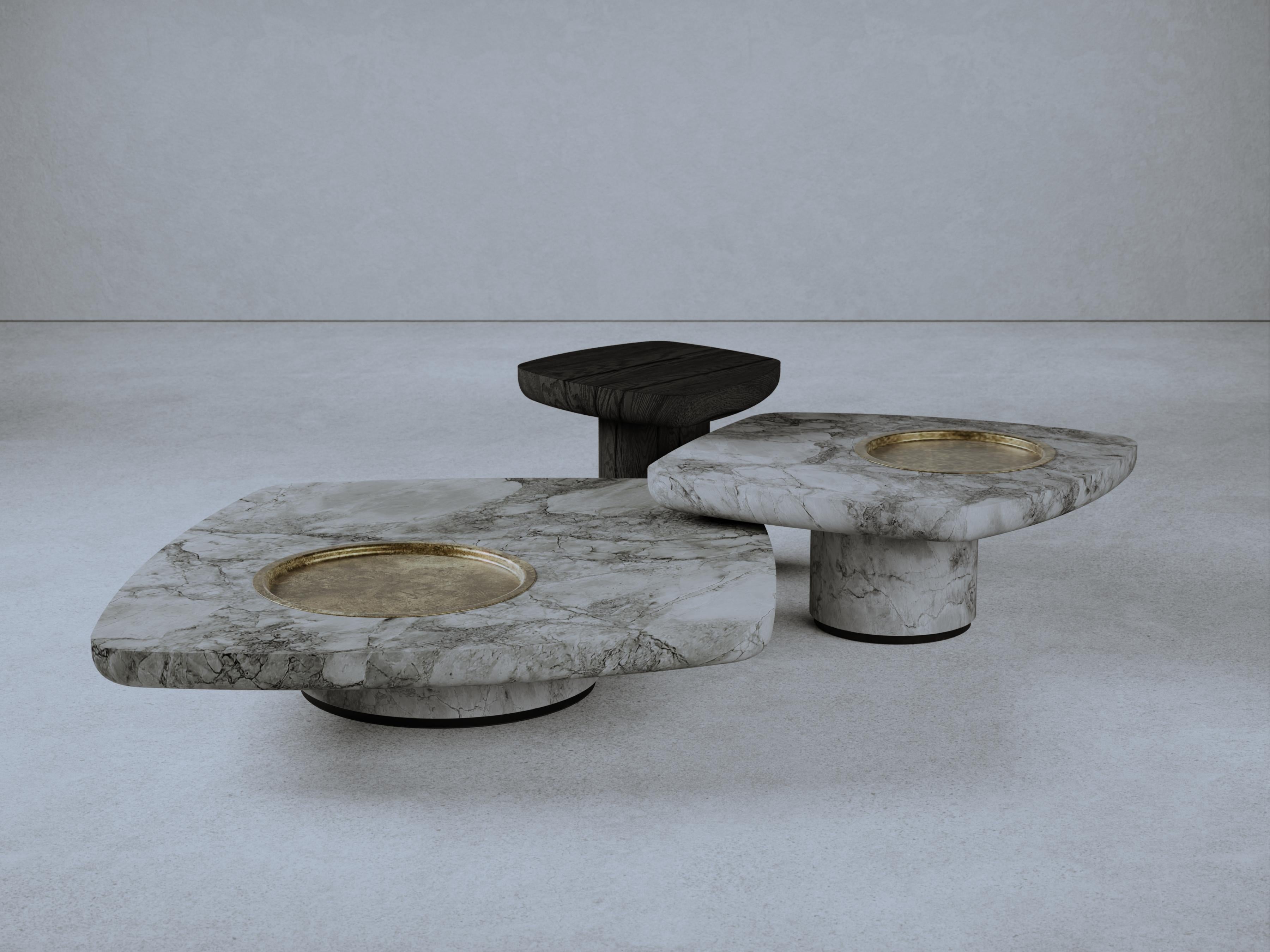 Set of 3 Blackbird Coffee Tables by Gio Pagani
Dimensions: High: D 50 x W 50 x H 46 cm.
Mid: D 77 x W 83 x H 36 cm.
Low: D 120 x W 127 x H 26 cm.
Materials: Fir wood, superwhite marble and raw brass metal.

In a fluid society capable of mixing