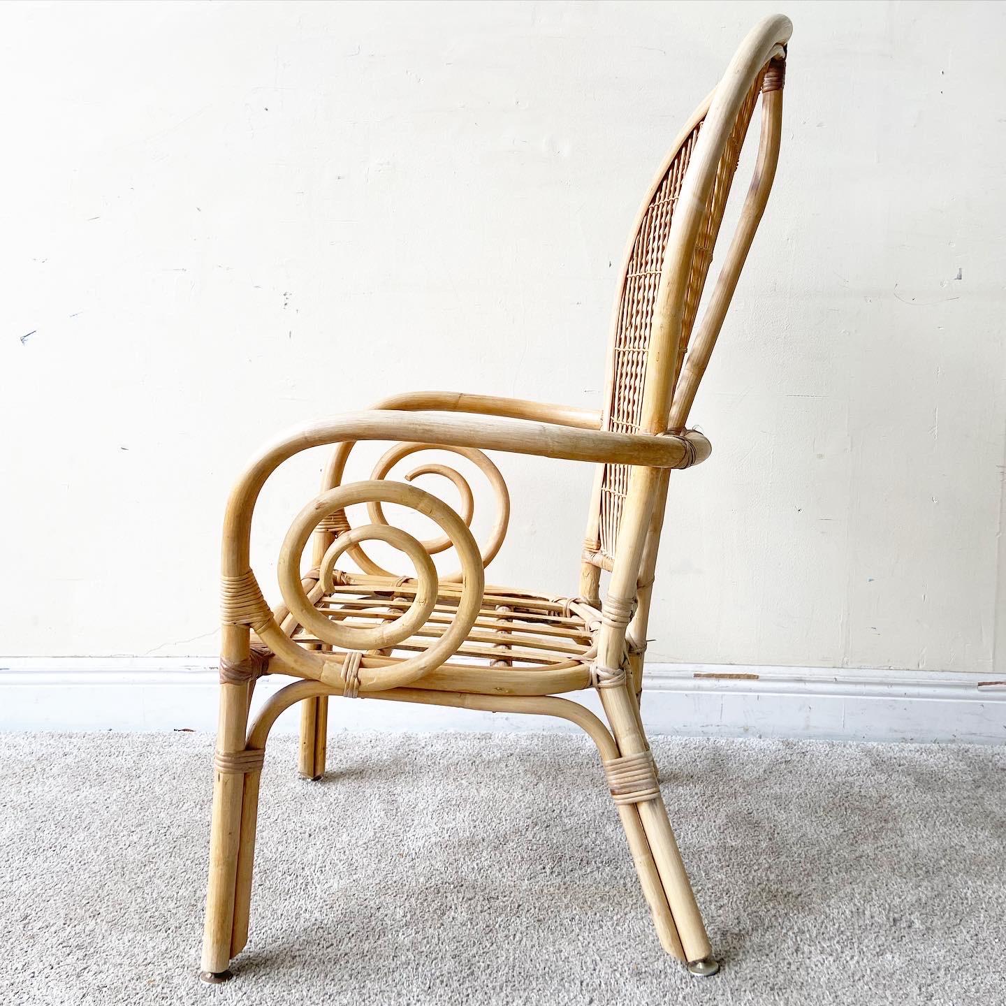 Incredible set of 3 bamboo rattan arm chairs. Each features a balloon back and swirling spiral bamboo arm rest.

Additional Information:
Material: Bamboo, Rattan
Color: Brown
Style: Boho Chic
Time Period: 1980s
Dimension: 26