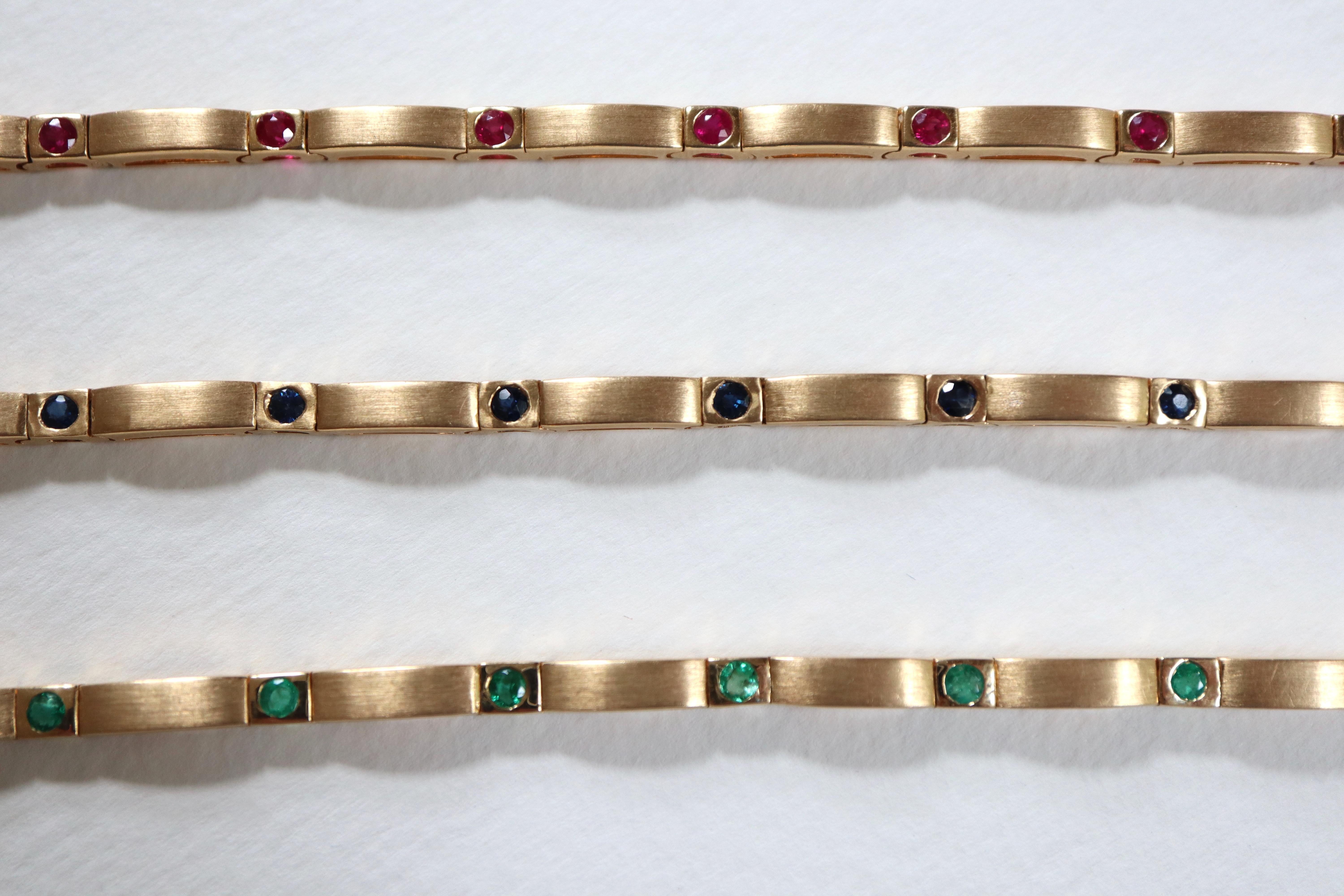 Mixed Cut Set of 3 Bracelets in 18 Kt Yellow Satin Gold, Rubies, Emeralds, Sapphires For Sale