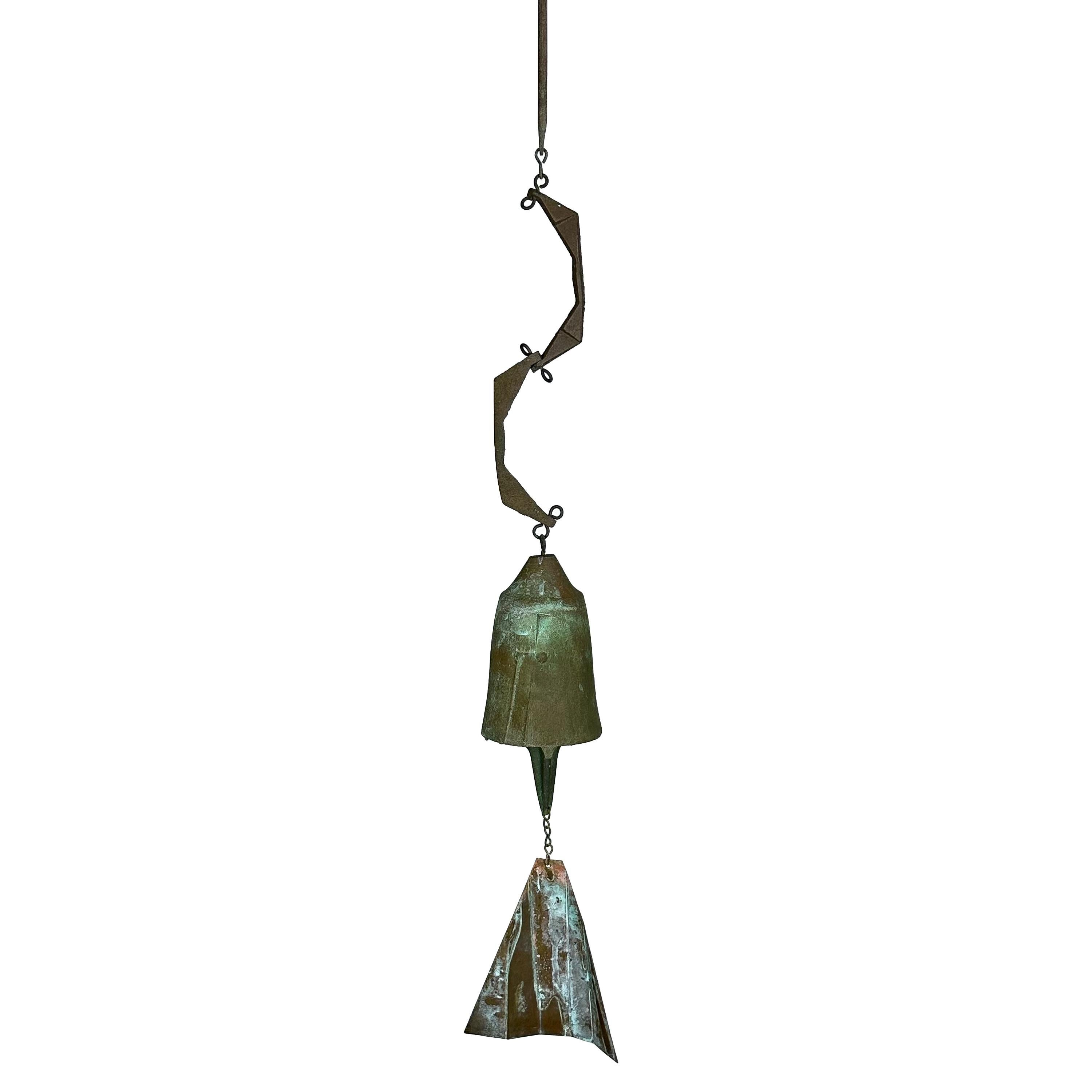 A set of 3 bronze bells / wind chimes designed by architect, Paolo Soleri for Arcosanti , circa 1970s. These gorgeous cast solid bronze Soleri bell features a beautiful patina, abstract design on the bells and unique bronze elements. Completely