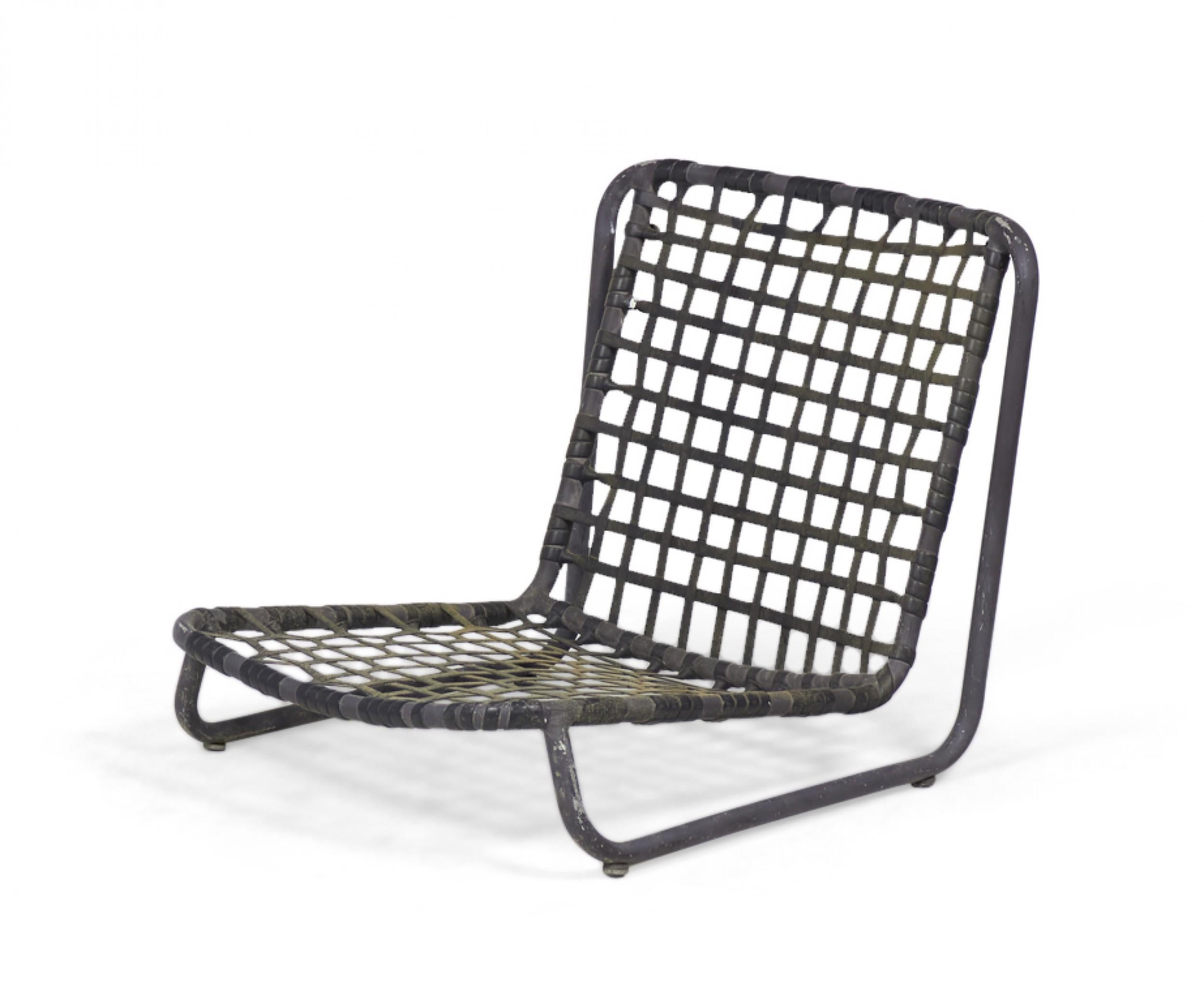 Pair of American mid-century outdoor aluminum beach / sand chairs with latticed backs and seats in an aluminum frame that sits low to the ground. (BROWN JORDAN)(PRICED AS PAIR)