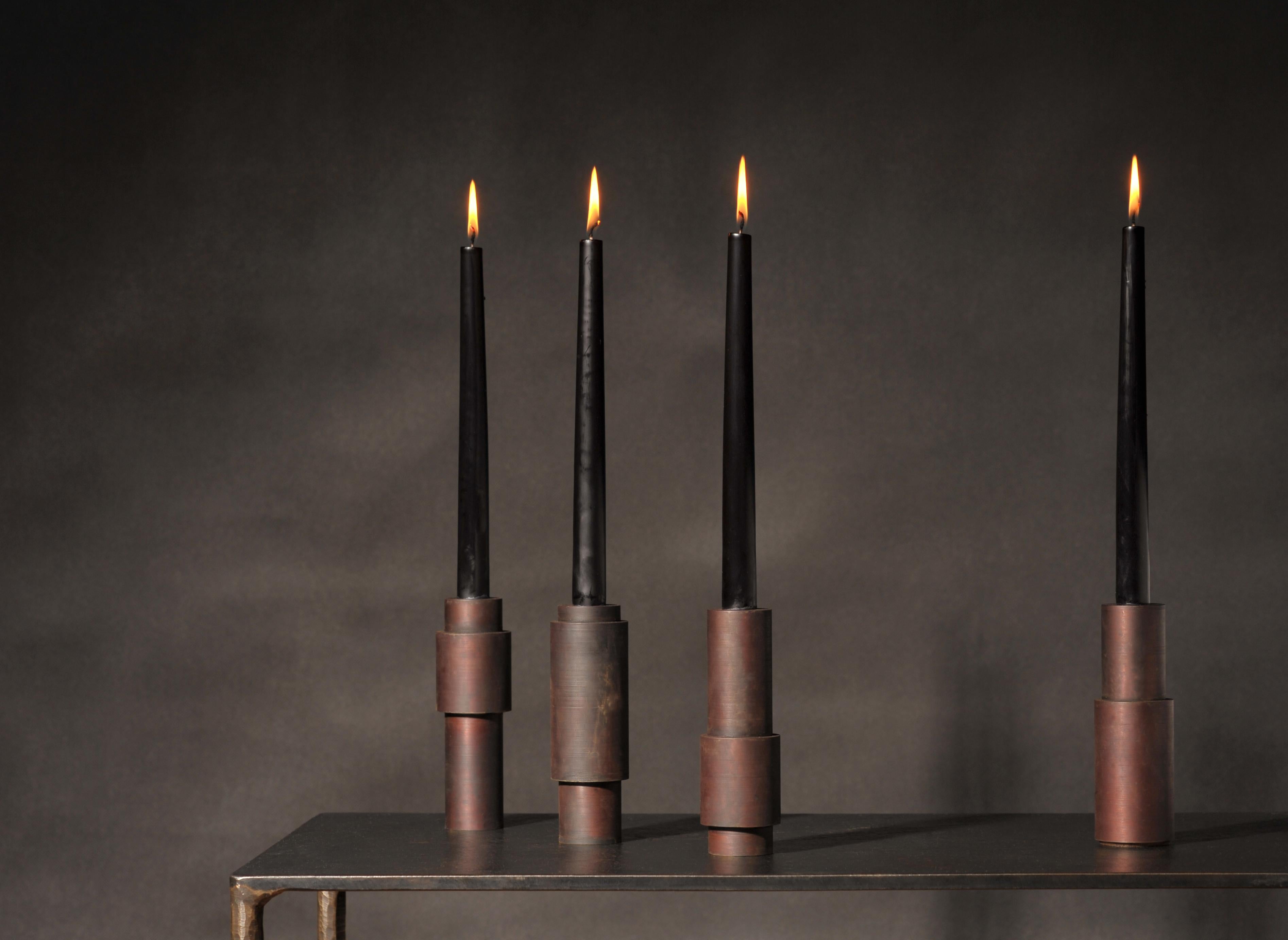 Set of 3 brown patina steel candlestick by Lukasz Friedrich.
Dimensions: D 5 x H 15 cm
Materials: Brown patina on steel.