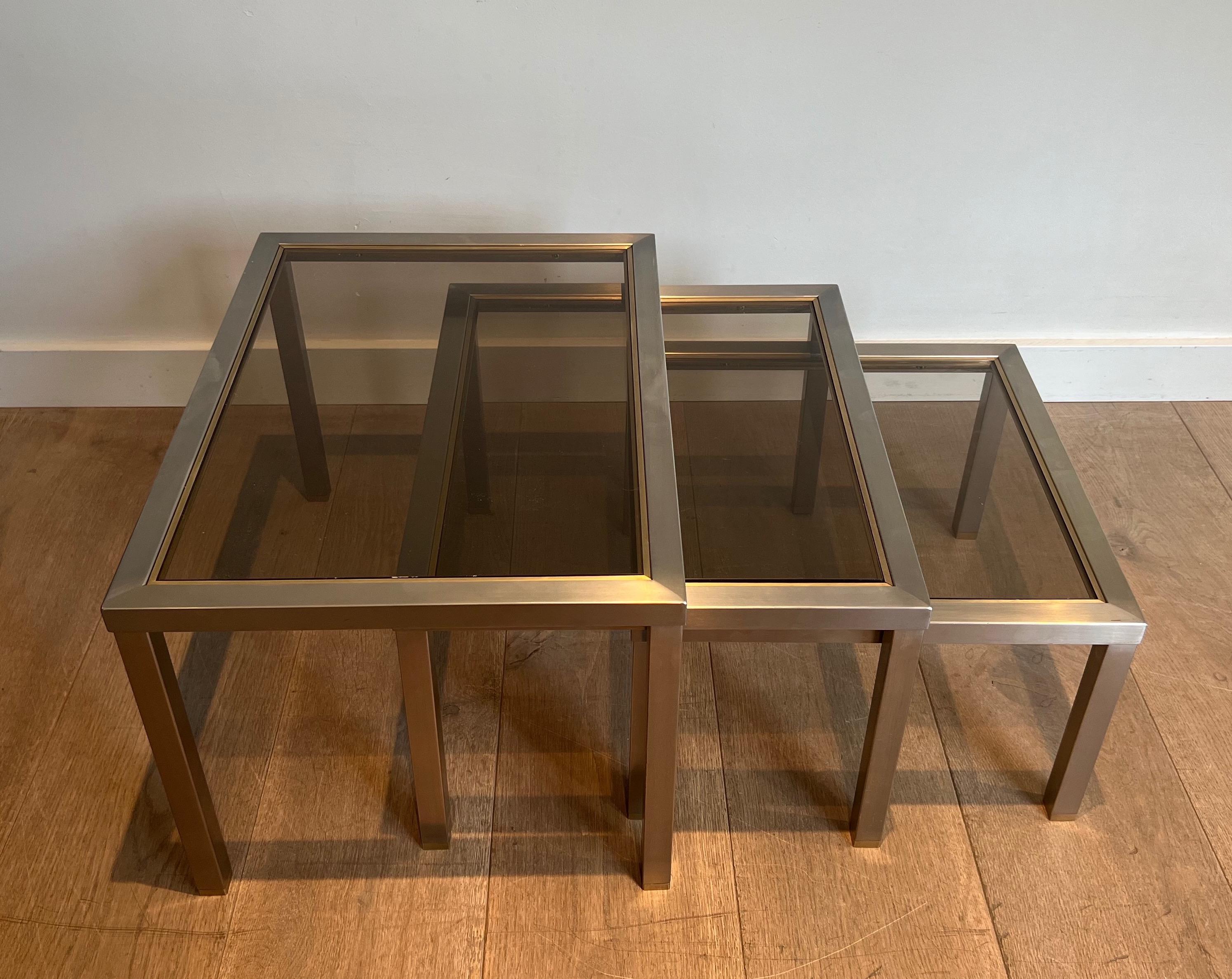 Mid-Century Modern Set of 3 Brushed Steel and Brass Nesting Tables Attributed to Guy Lefèvre For Sale