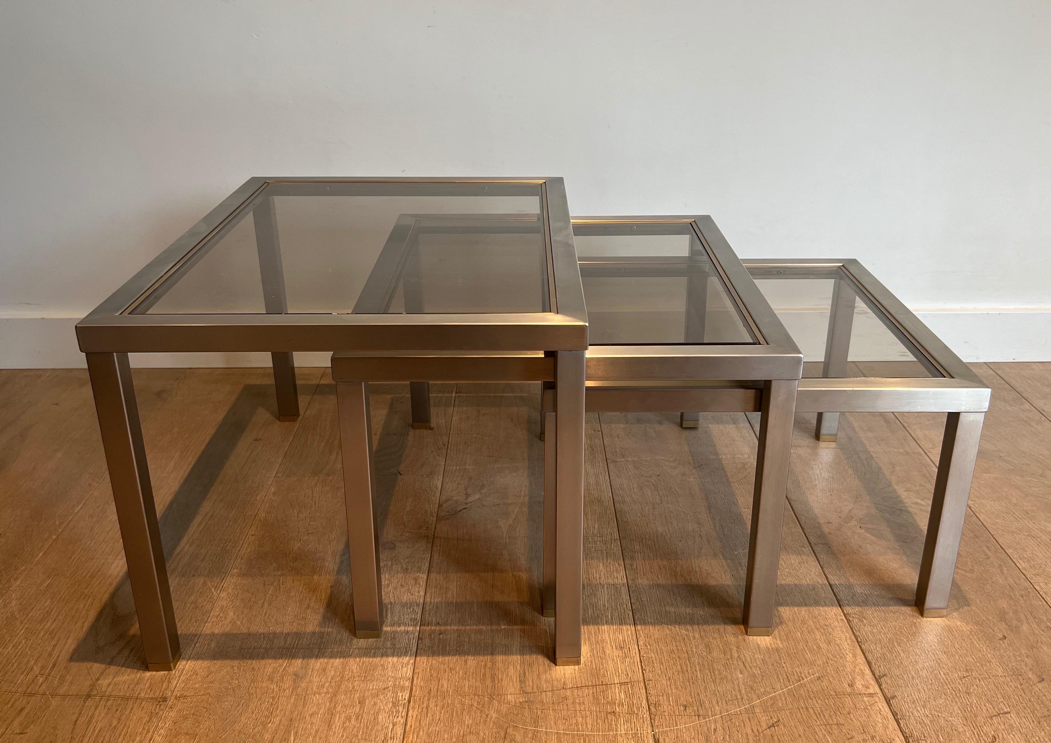 French Set of 3 Brushed Steel and Brass Nesting Tables Attributed to Guy Lefèvre For Sale