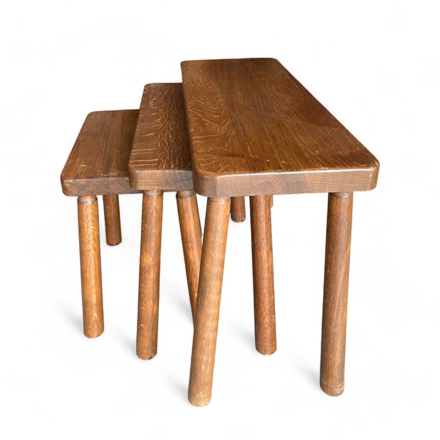 This is a set of 3 exceptionally well-made oak side table. Ideal in a Danish Modern esthetic or mid century modern. These nesting tables would be great as end tables as well as console/lamp table.