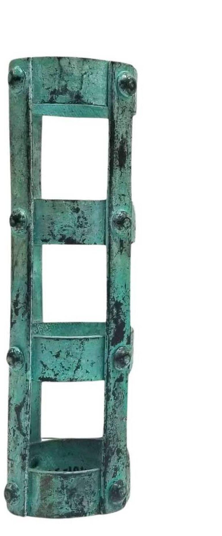 Introducing our set of 3 rugged Brutalist-style cast bronze cages—a perfect fusion of industrial charm and ambient lighting. Meticulously crafted in the shape of riveted strap iron cages, these unique pieces are ideal for votive or tea light