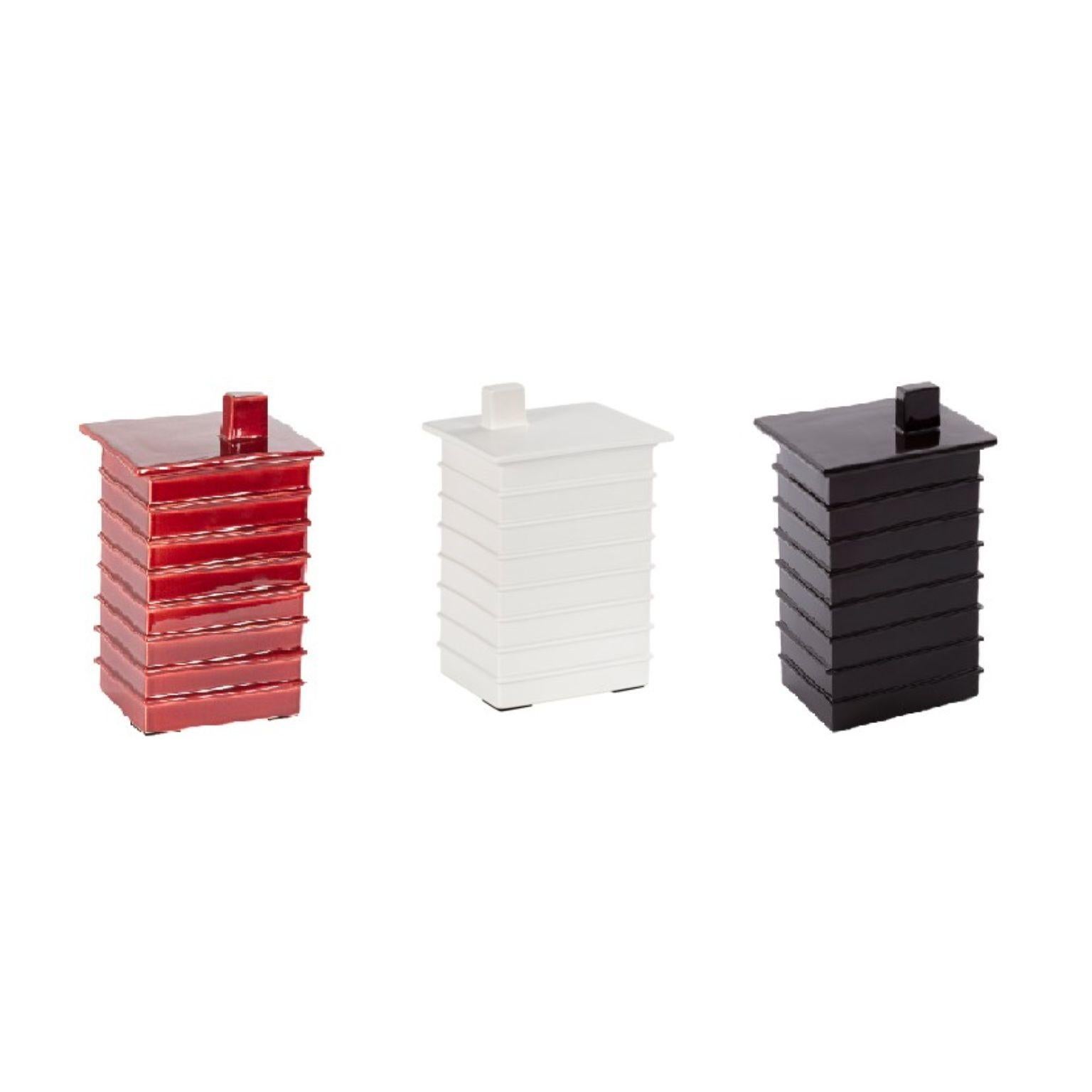 Set of 3 building small boxes by Pulpo
Dimensions: D14.5 x W11.5 x H23.5 cm
Materials: ceramic

Also available in different colours. 

This building boxes bring to mind the industrial areas so familiar within our urban landscapes. An