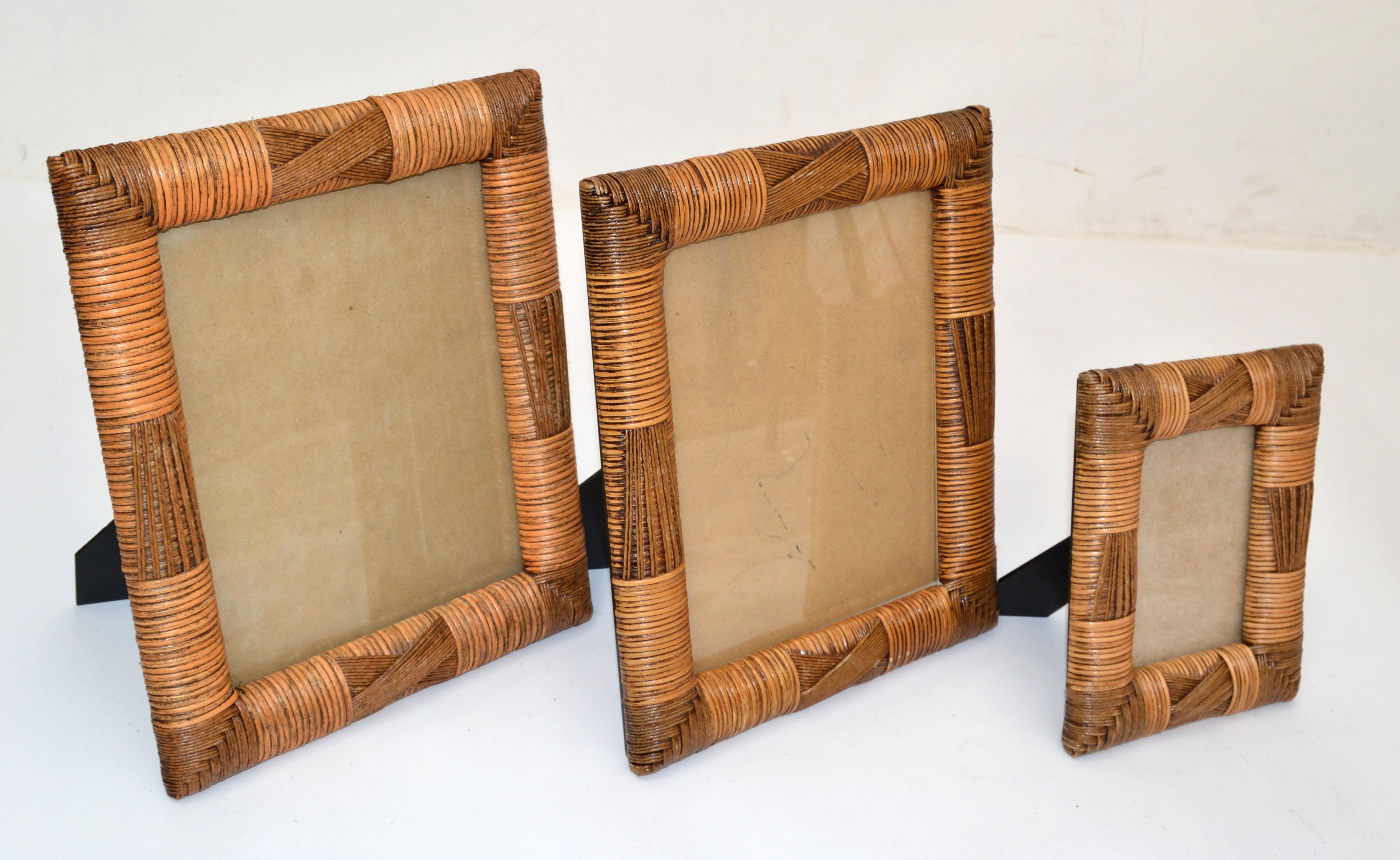 Set of 3 handcrafted Bohemian Chic picture frames made out of wicker, cane & wood.
Bigger Frames hold an image up to 7.5 x 9 inches
Smaller Frame holds an image up to 3.5 x 5 inches.
Measurement smaller Picture Frame: 
Height 9 x 7 x 1 inches.